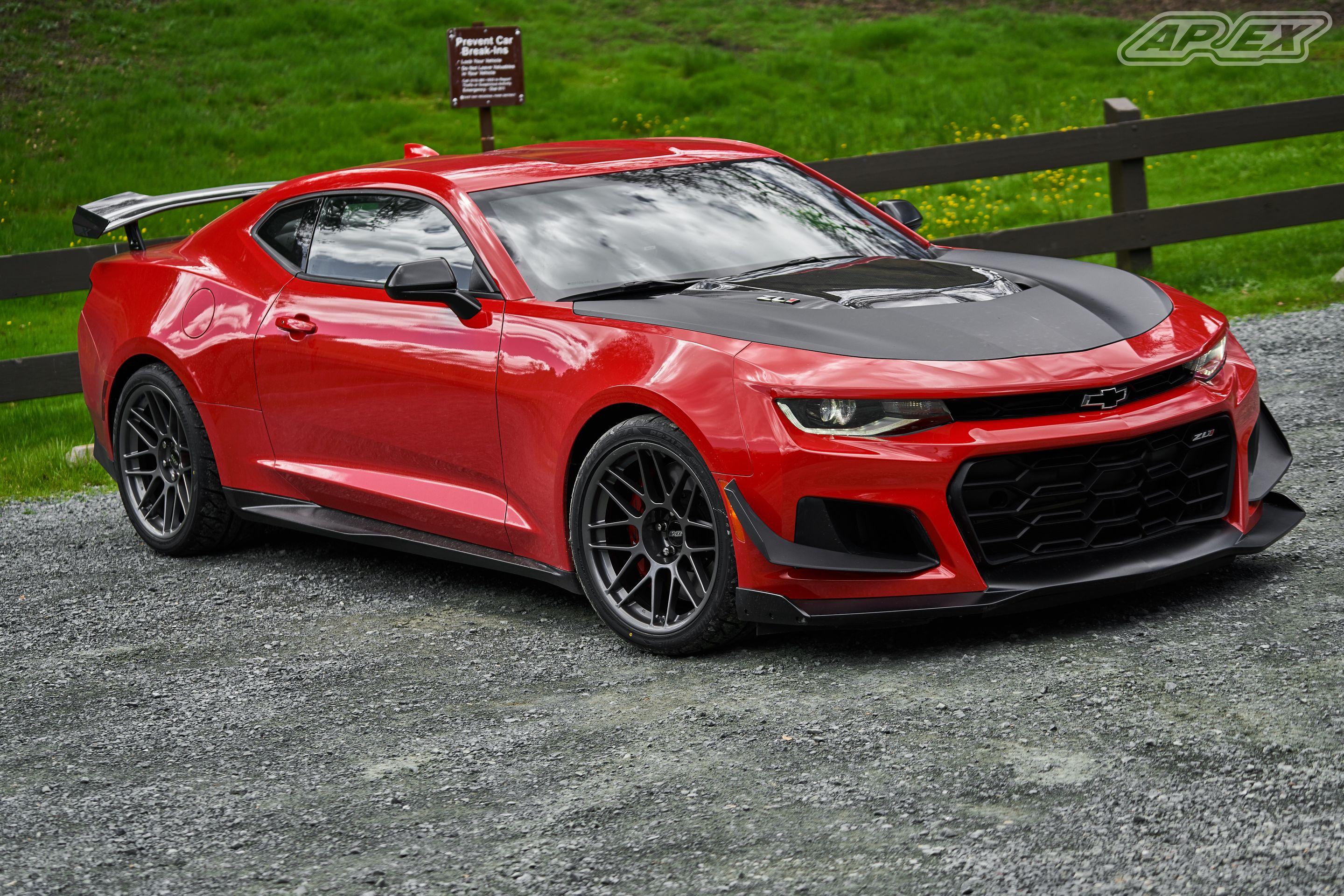 Red Chevrolet 6th Gen Camaro ZL1 1LE with 19" ARC-8 Apex wheels in Anthracite