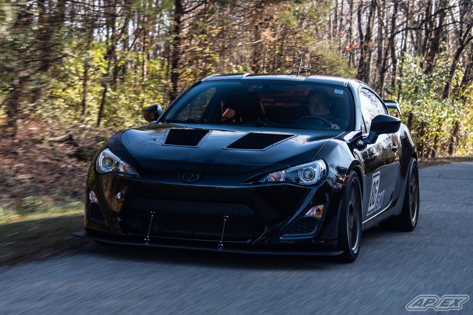 Black Scion FR-S with 17" ARC-8 Apex wheels in Satin Bronze