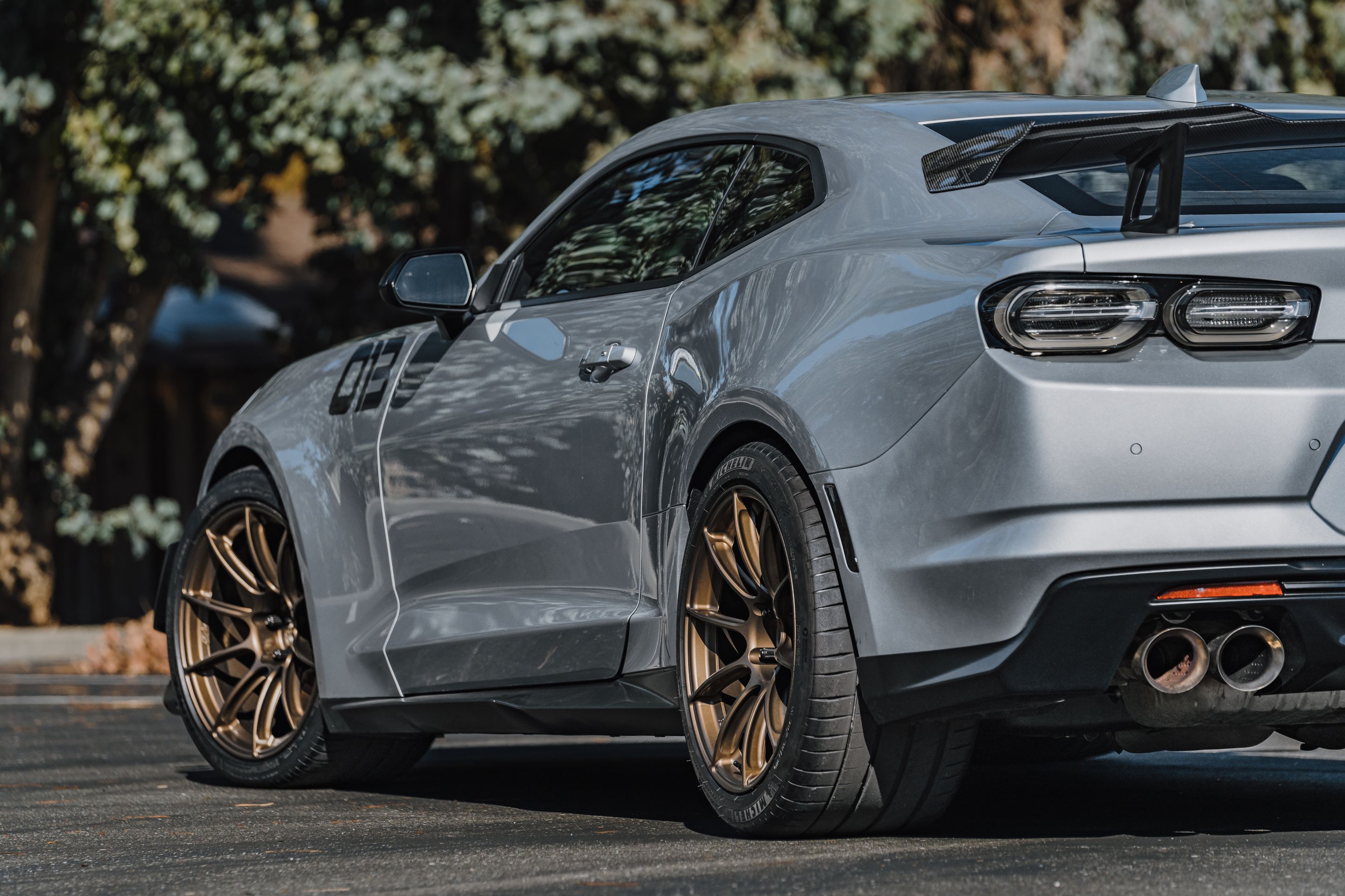 Silver Chevrolet 6th Gen Camaro ZL1 1LE with 19" SM-10RS Apex wheels in Satin Bronze