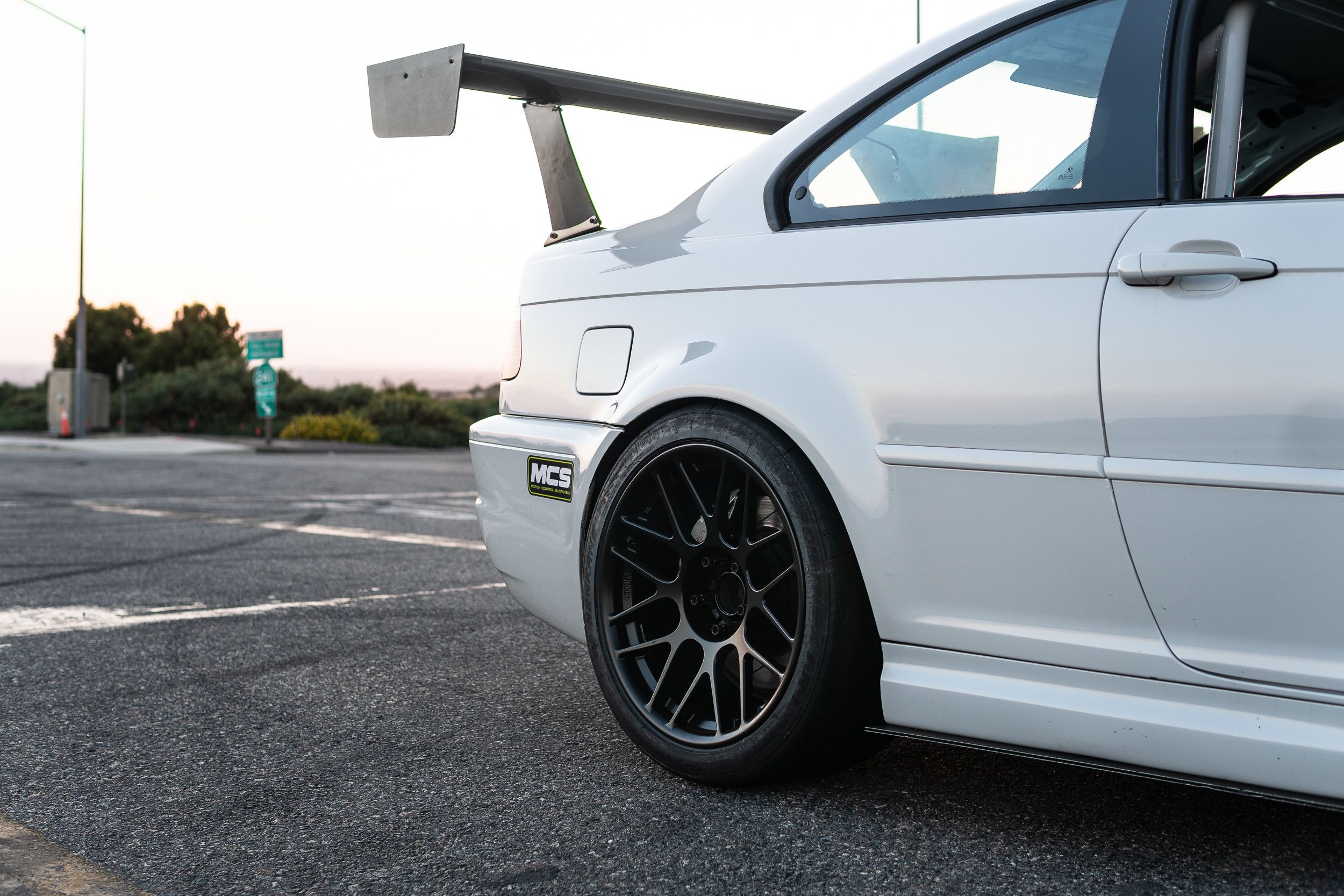 White BMW E46 M3 with 18" ARC-8R Apex wheels in Satin Black