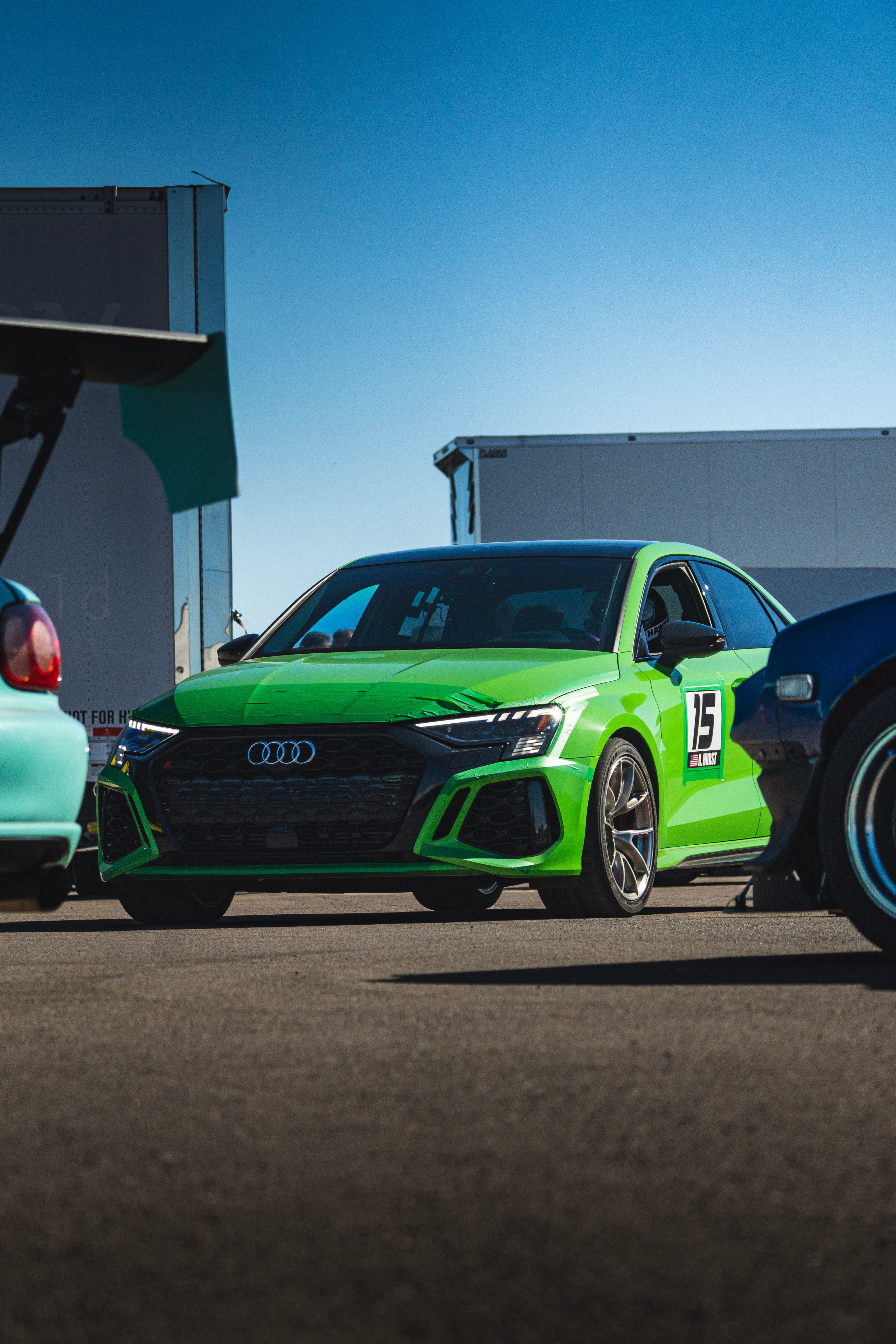 Green Audi 8Y RS 3 with 18" VS-5RS Apex wheels in Brushed Clear