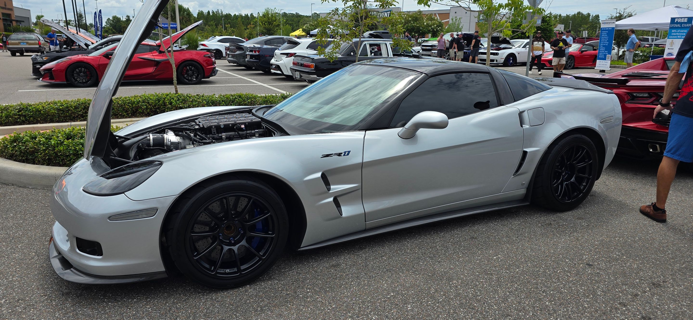 Silver Chevrolet C6 Corvette ZR-1 with 18" SM-10RE Apex wheels in Satin Black