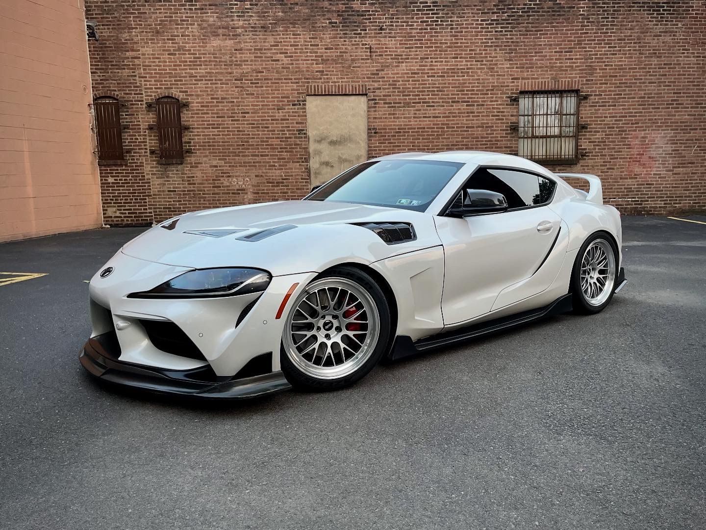 White Toyota GR Supra with 19" ML-10RT Apex wheels in Machined Lip Race Silver
