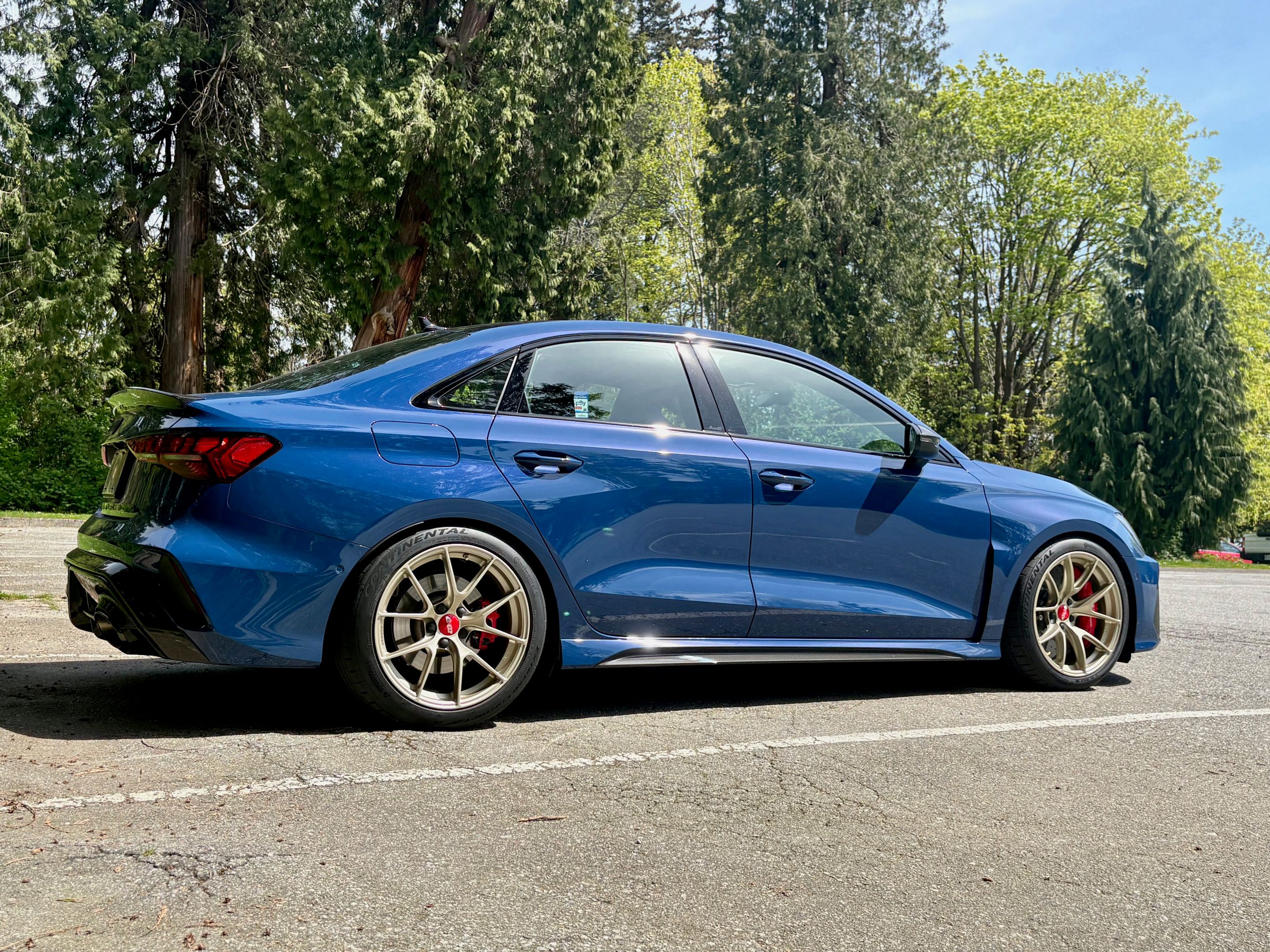 Blue Audi 8Y RS 3 with 18" VS-5RS Apex wheels in Motorsport Gold