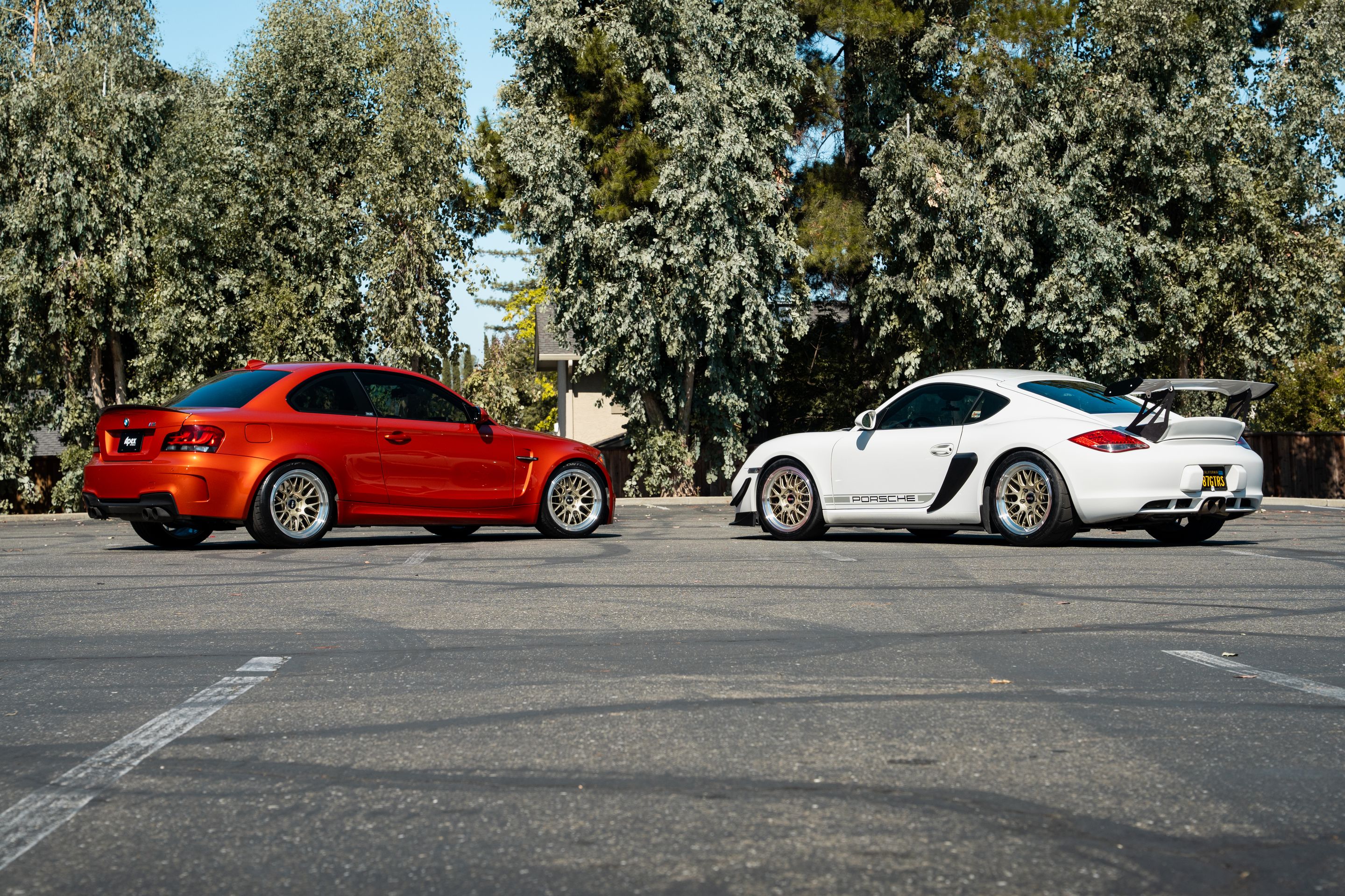 Orange BMW E82 1M with 18" ML-10RT Apex wheels in Machined Lip Gloss Motorsport Gold