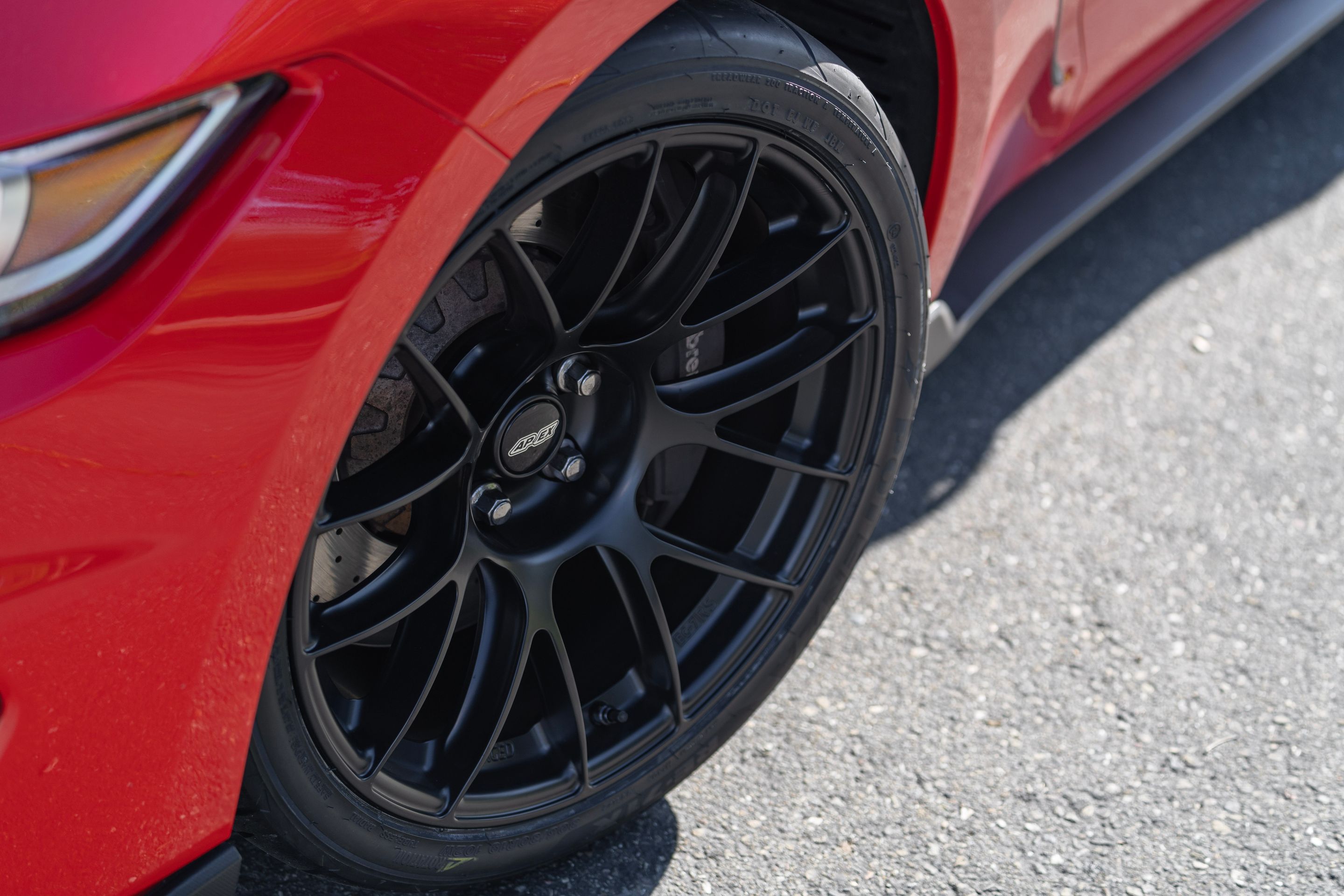 Red Ford S550 Mustang GT350 with 19" EC-7RS Apex wheels in Satin Black