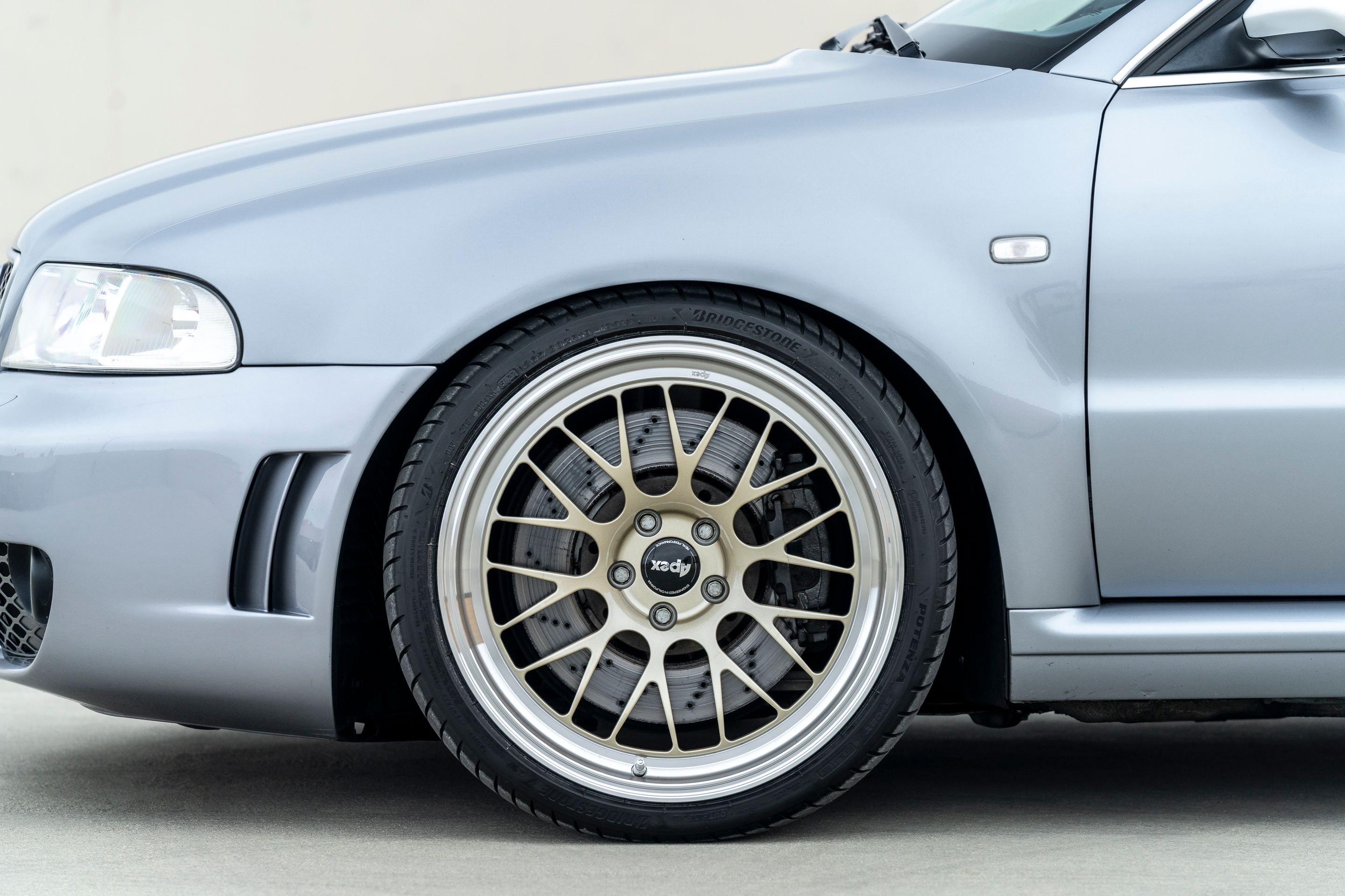 Silver Audi B5 RS 4 Avant/Wagon with 19" ML-10RT Apex wheels in Machined Lip Gloss Motorsport Gold