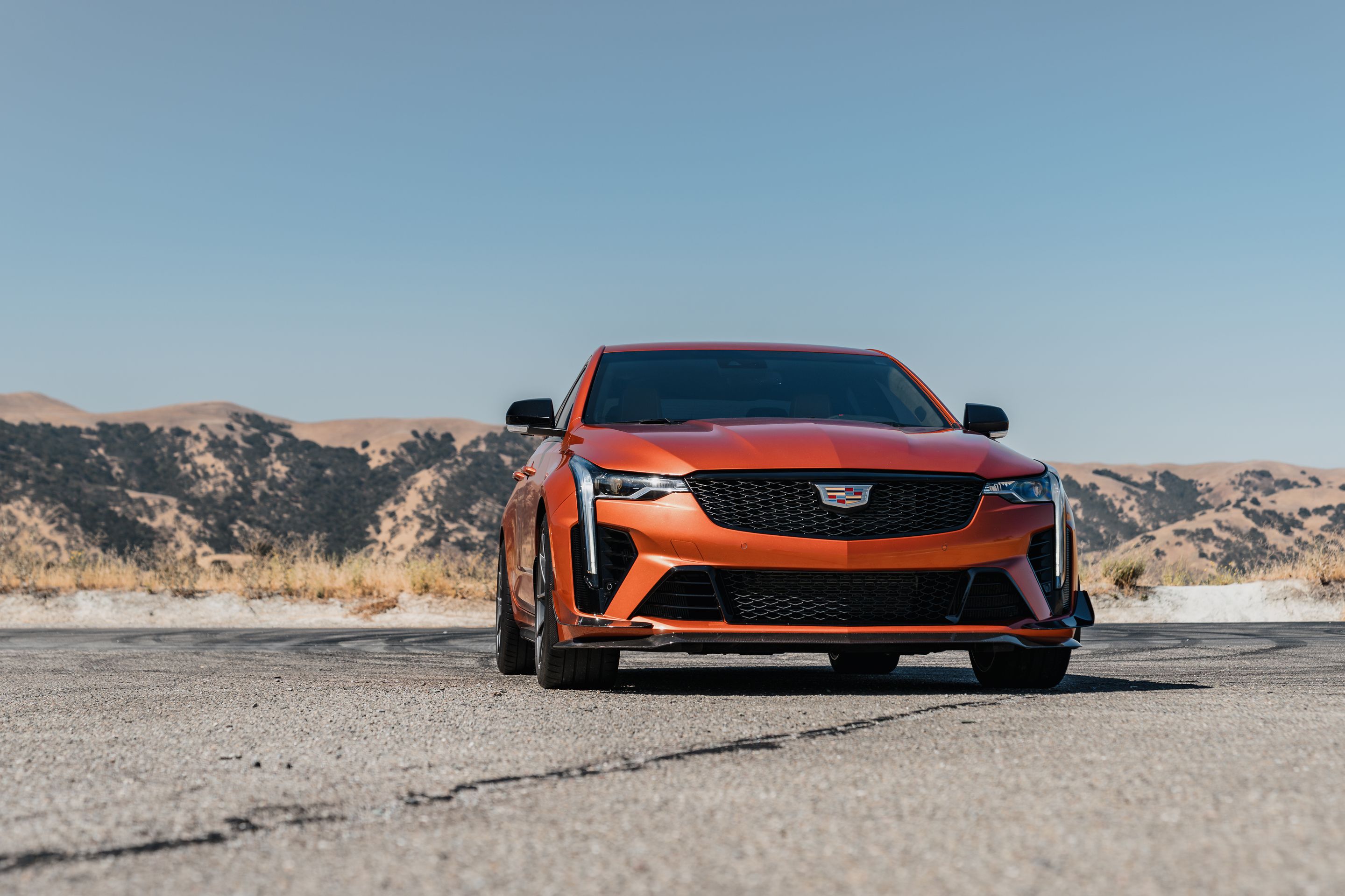 Orange Cadillac CT4-V Blackwing with 18" VS-5RS Apex wheels in Anthracite