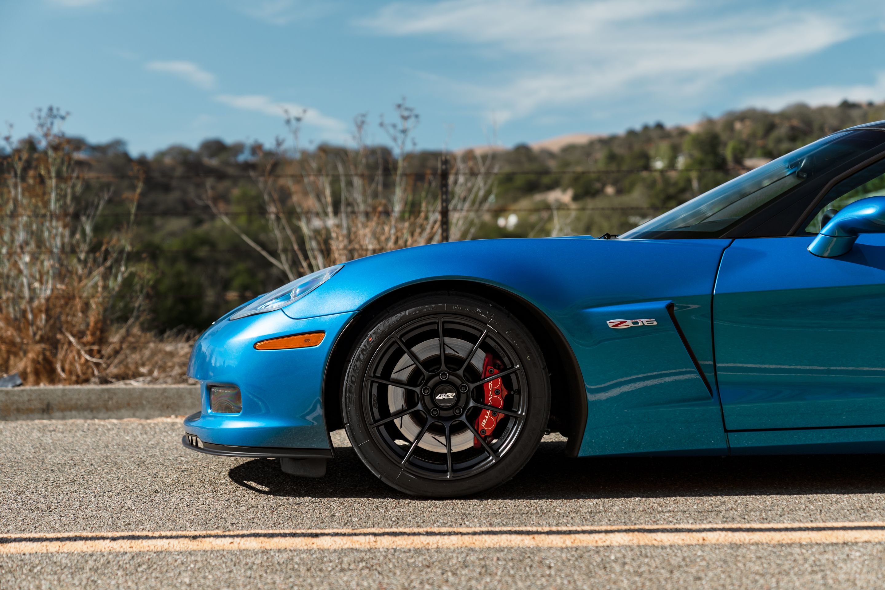 Blue Chevrolet C6 Corvette Z06 with 18" SM-10RS Apex wheels in Satin Black
