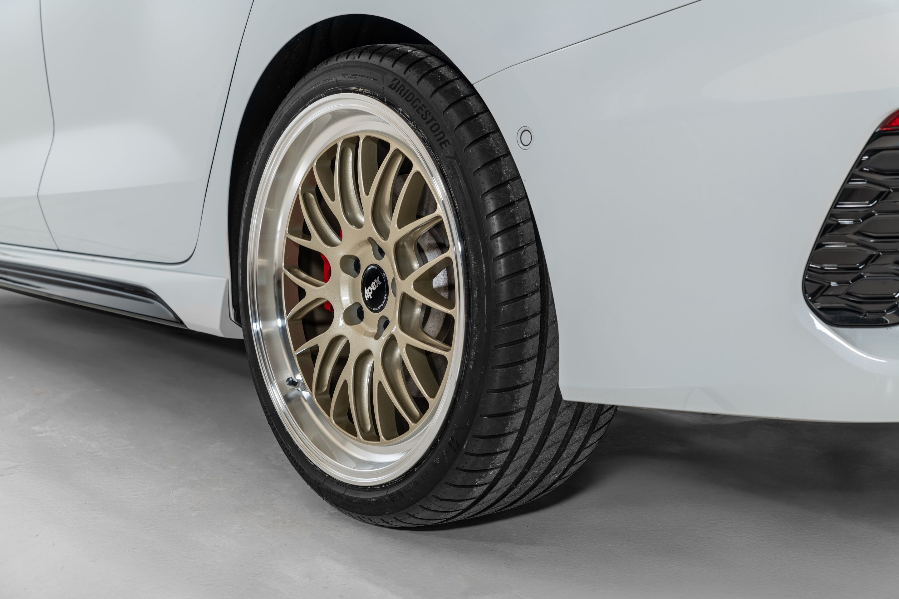 Race Livery Audi 8Y RS 3 with 19" ML-10RT Apex wheels in Machined Lip Gloss Motorsport Gold