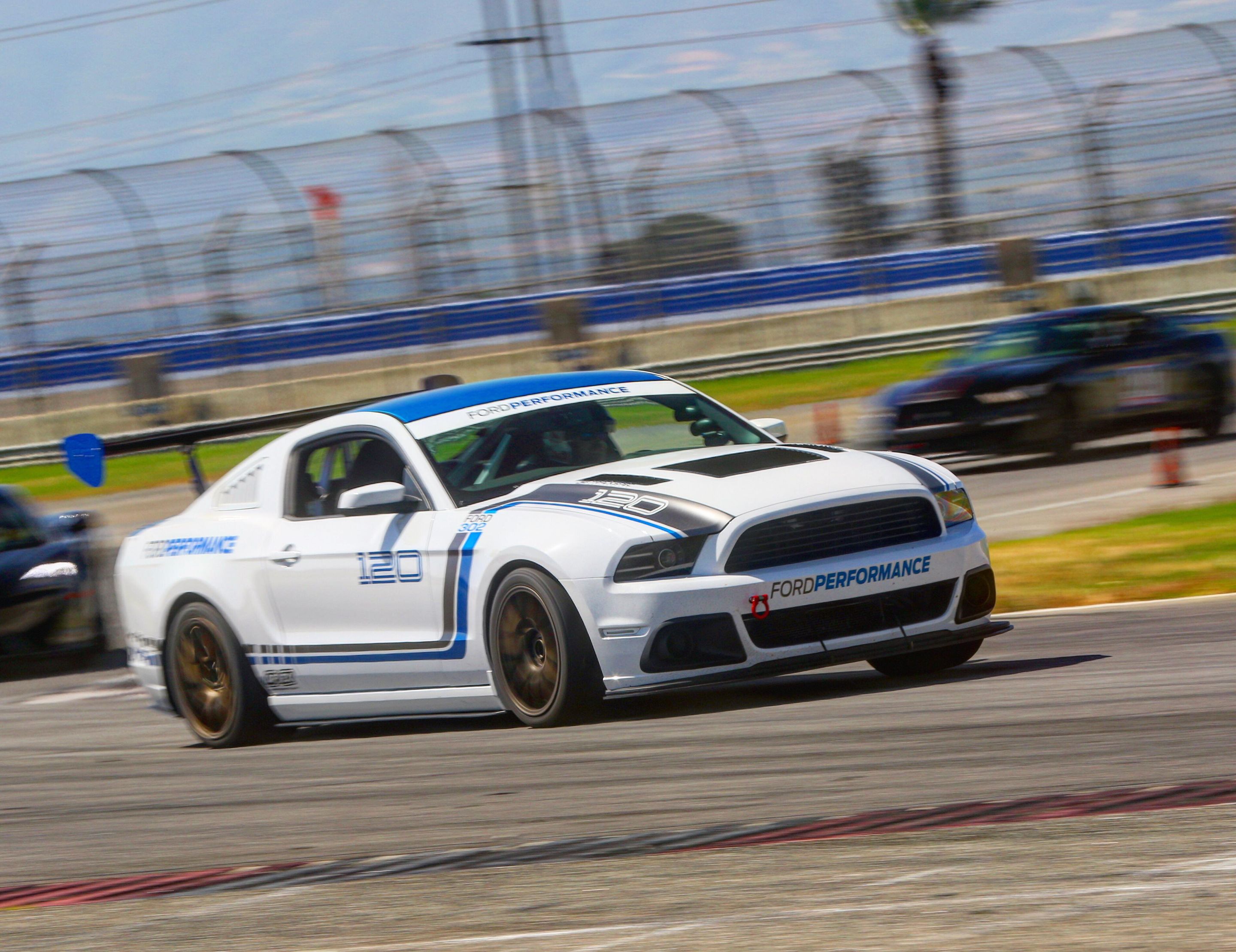 White Ford S197 Mustang GT with 18" EC-7 Apex wheels in Satin Bronze