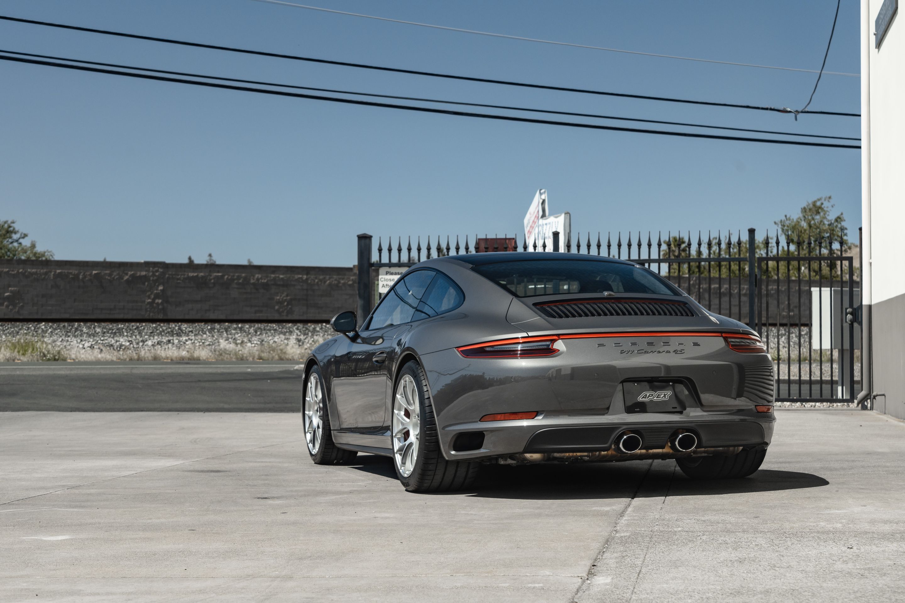 Grey Porsche 911 991.2 Carrera 4S with 19" EC-7RS Apex wheels in Race Silver