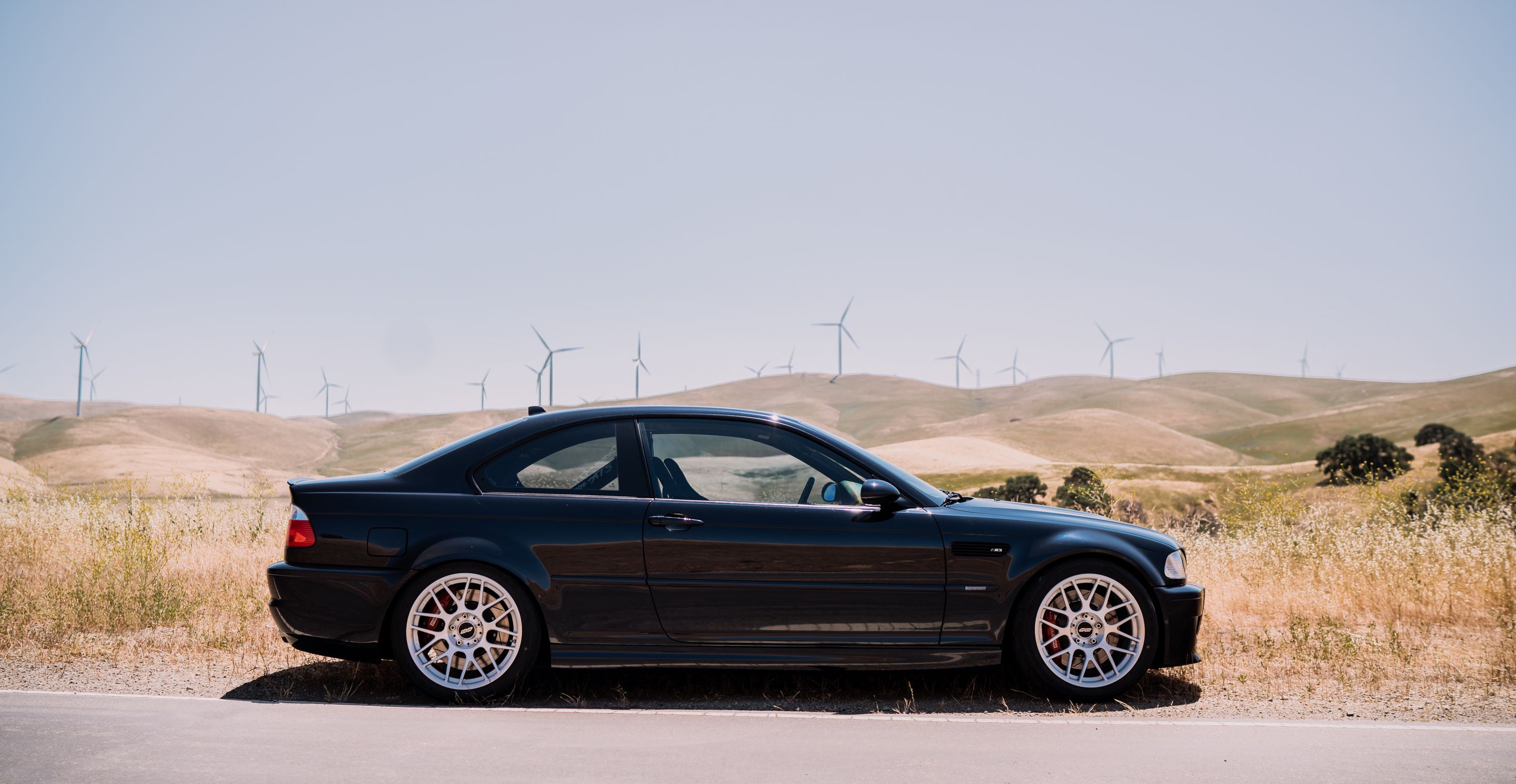 Black BMW E46 M3 with 18" ARC-8R Apex wheels in Brushed Clear