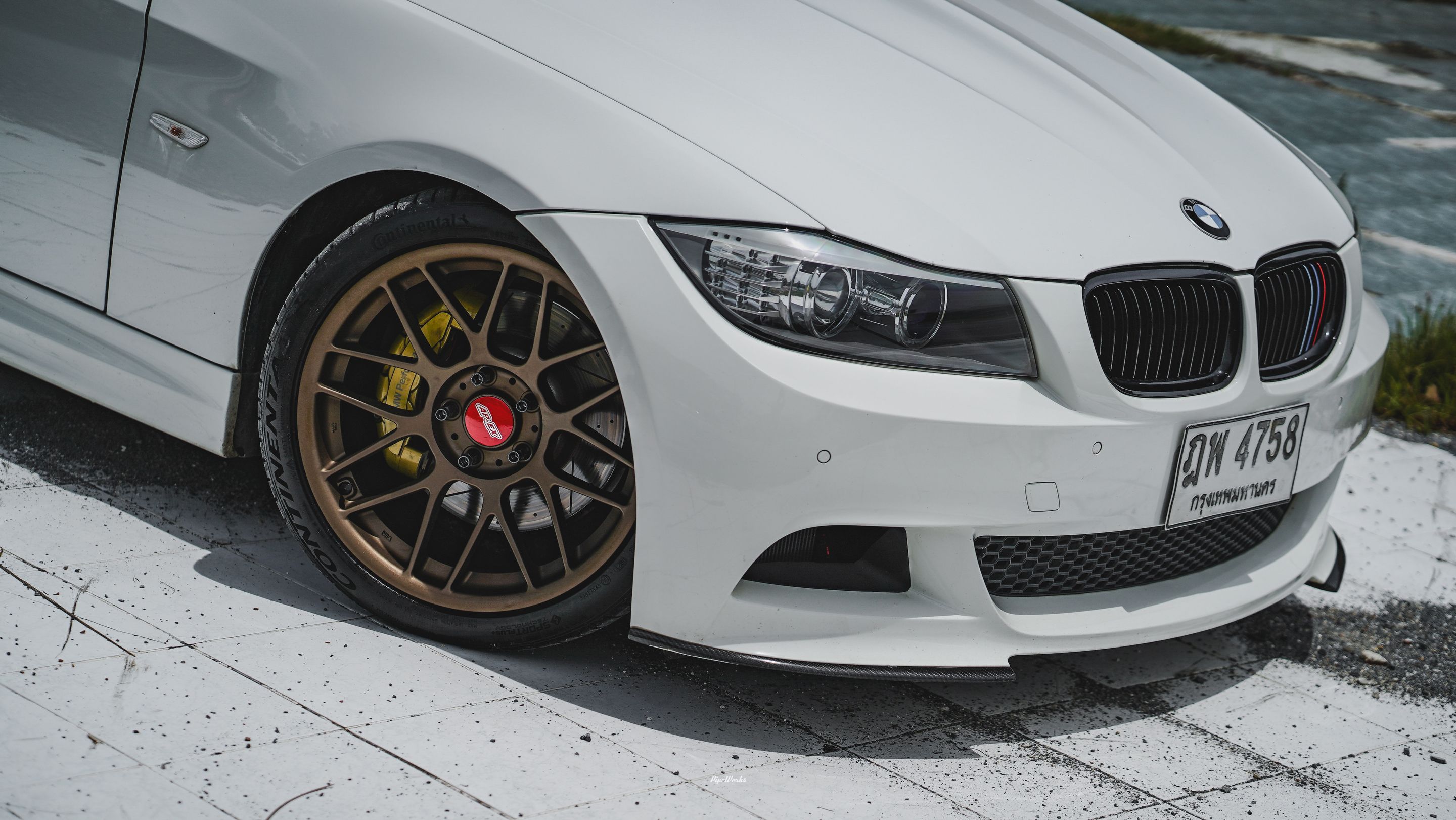 White BMW E90 LCI Sedan 3 Series with 18" ARC-8 Apex wheels in Satin Bronze