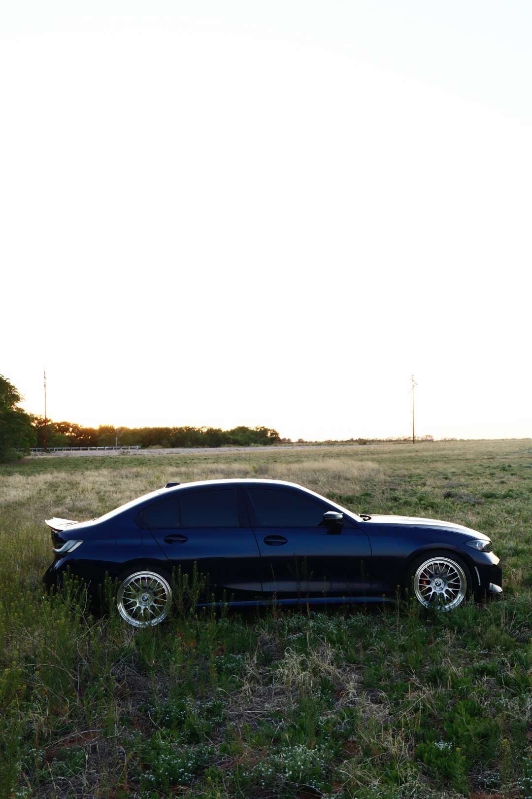 Black BMW G20 Sedan 3 Series with 19" ML-10RT Apex wheels in Machined Lip Race Silver