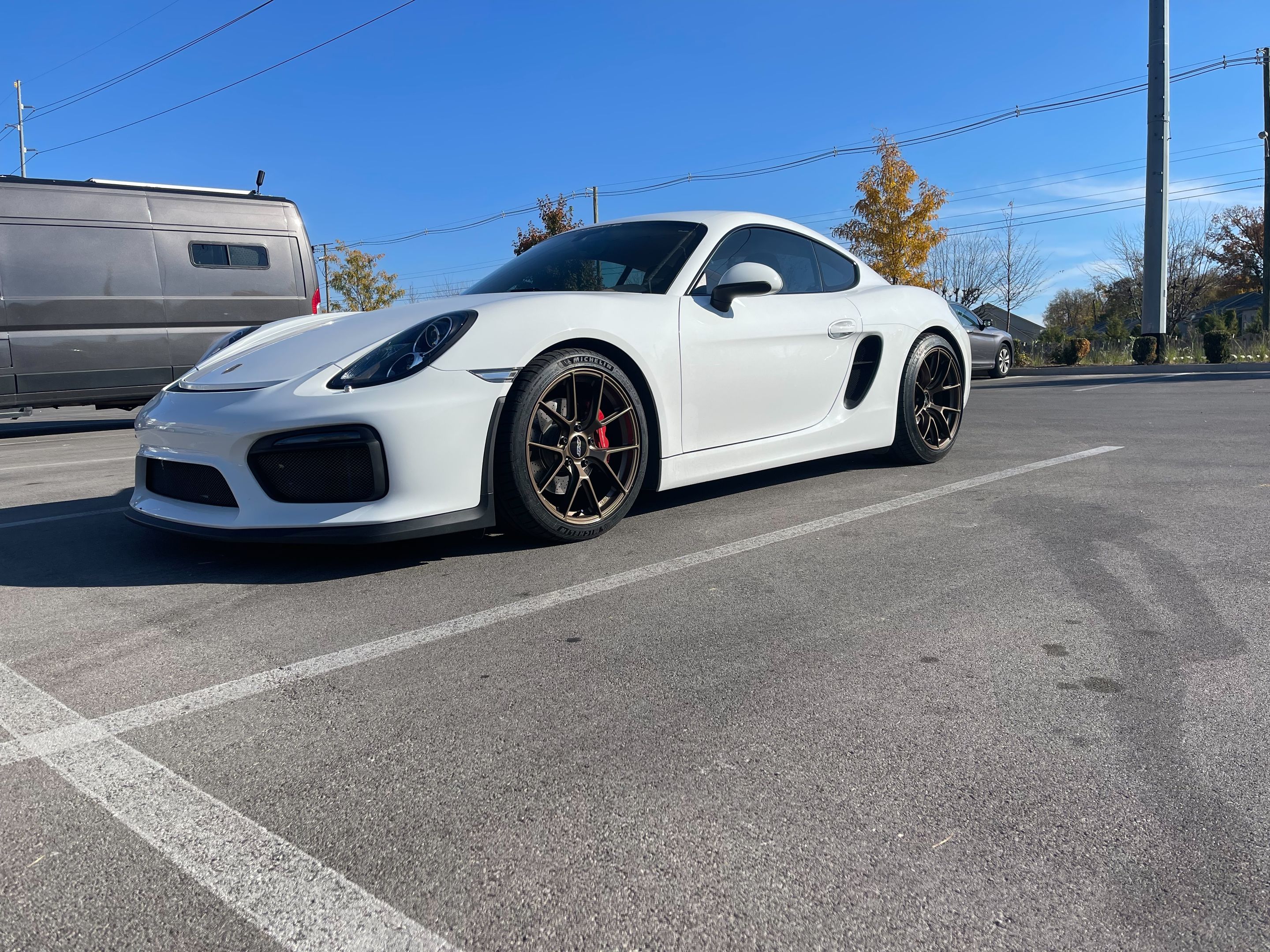 White Porsche 981 Cayman S with 19" VS-5RS Apex wheels in Satin Bronze
