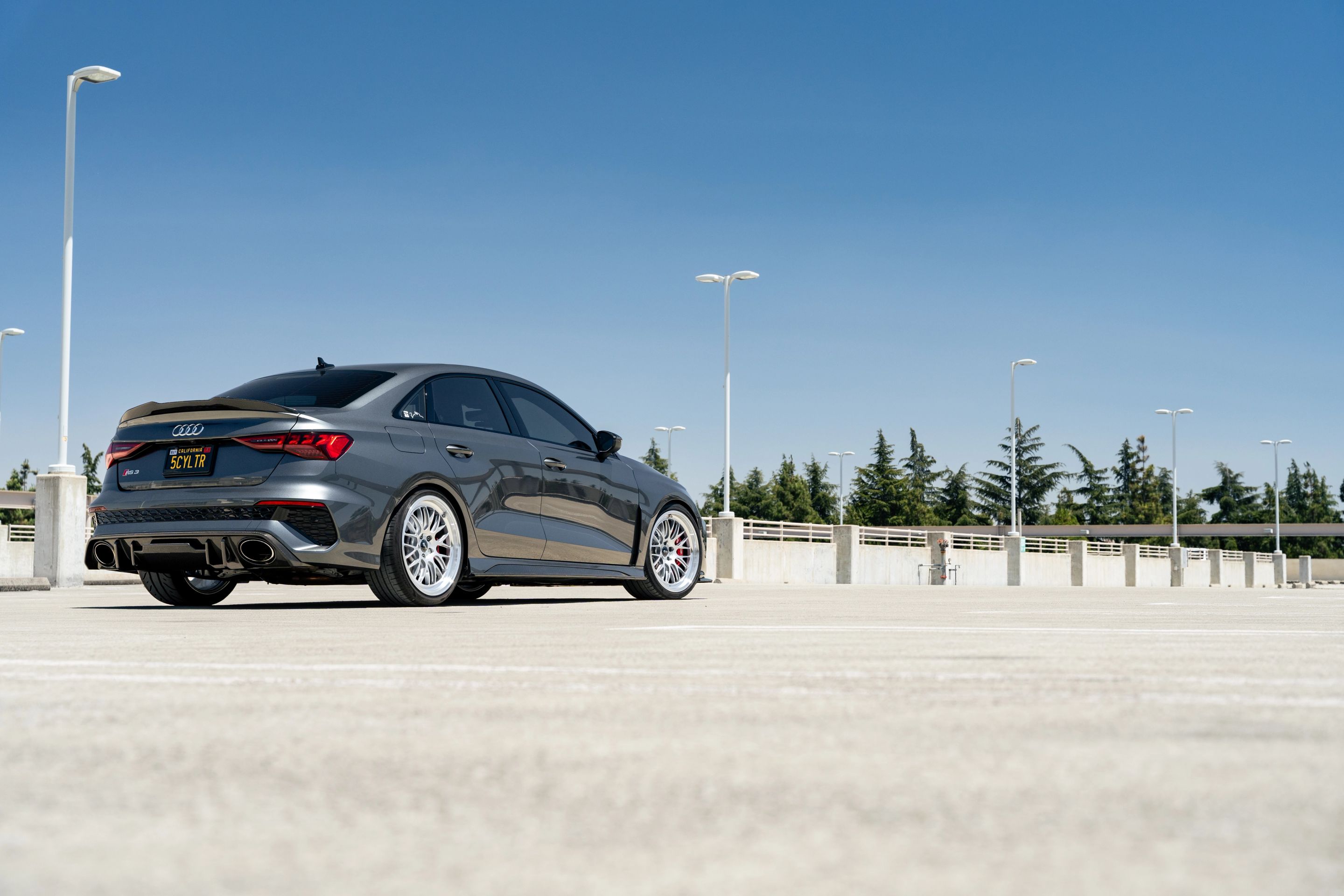 Grey Audi 8Y RS 3 with 19" ML-10RT Apex wheels in Machined Lip Race Silver