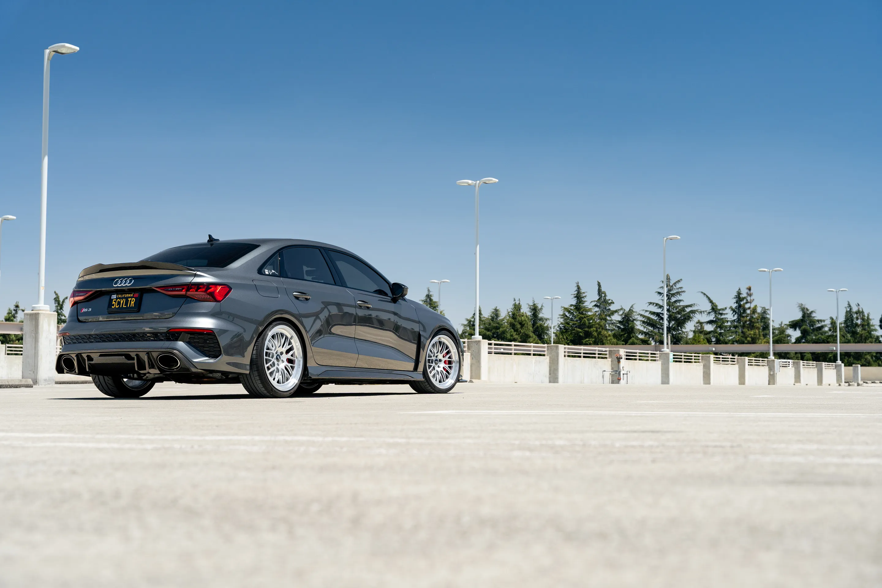 Grey Audi 8Y RS 3 with 19" ML-10RT Apex wheels in Machined Lip Race Silver