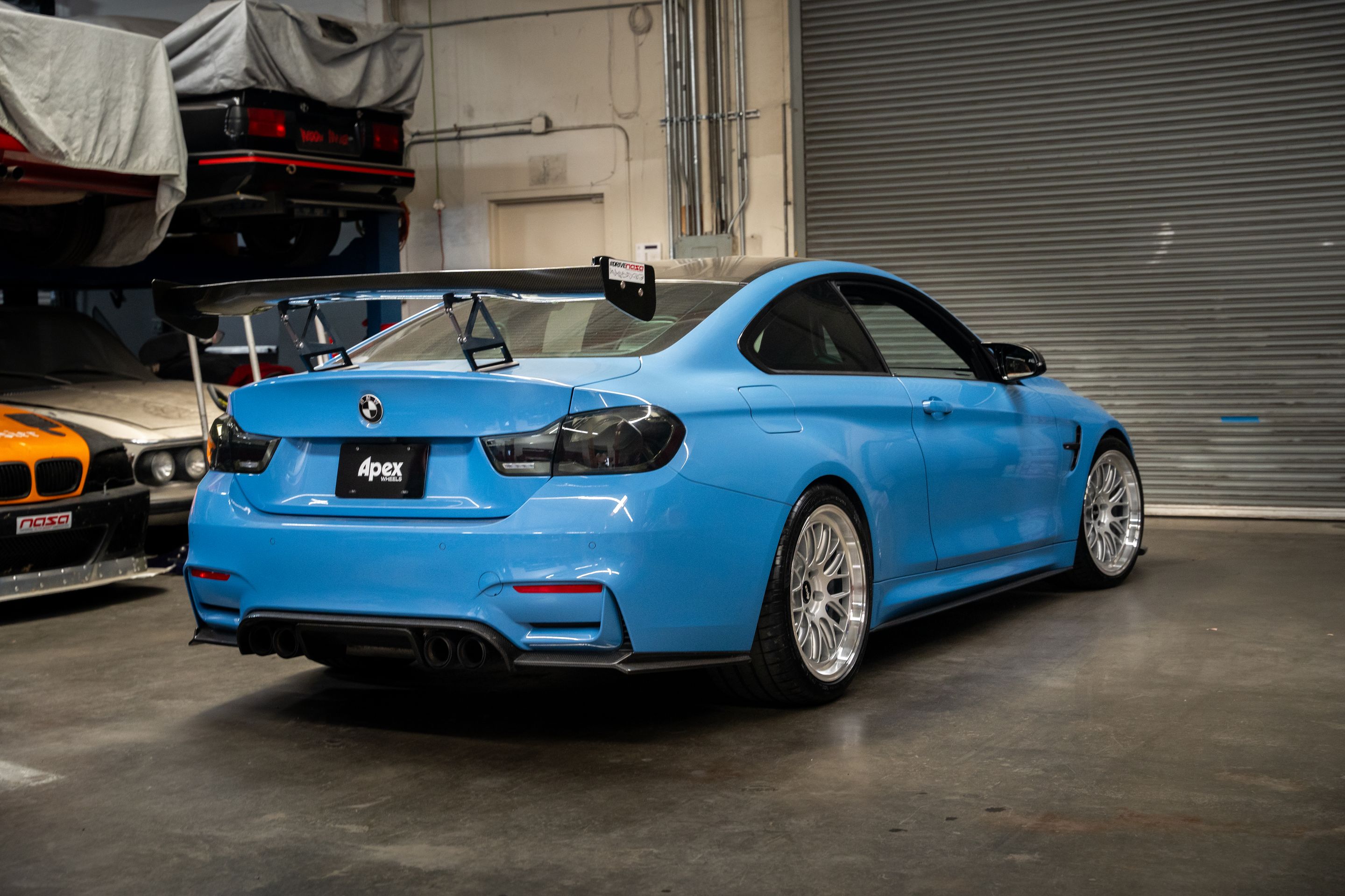 Blue BMW F82 Coupe M4 with 19" ML-10RT Apex wheels in Machined Lip Race Silver