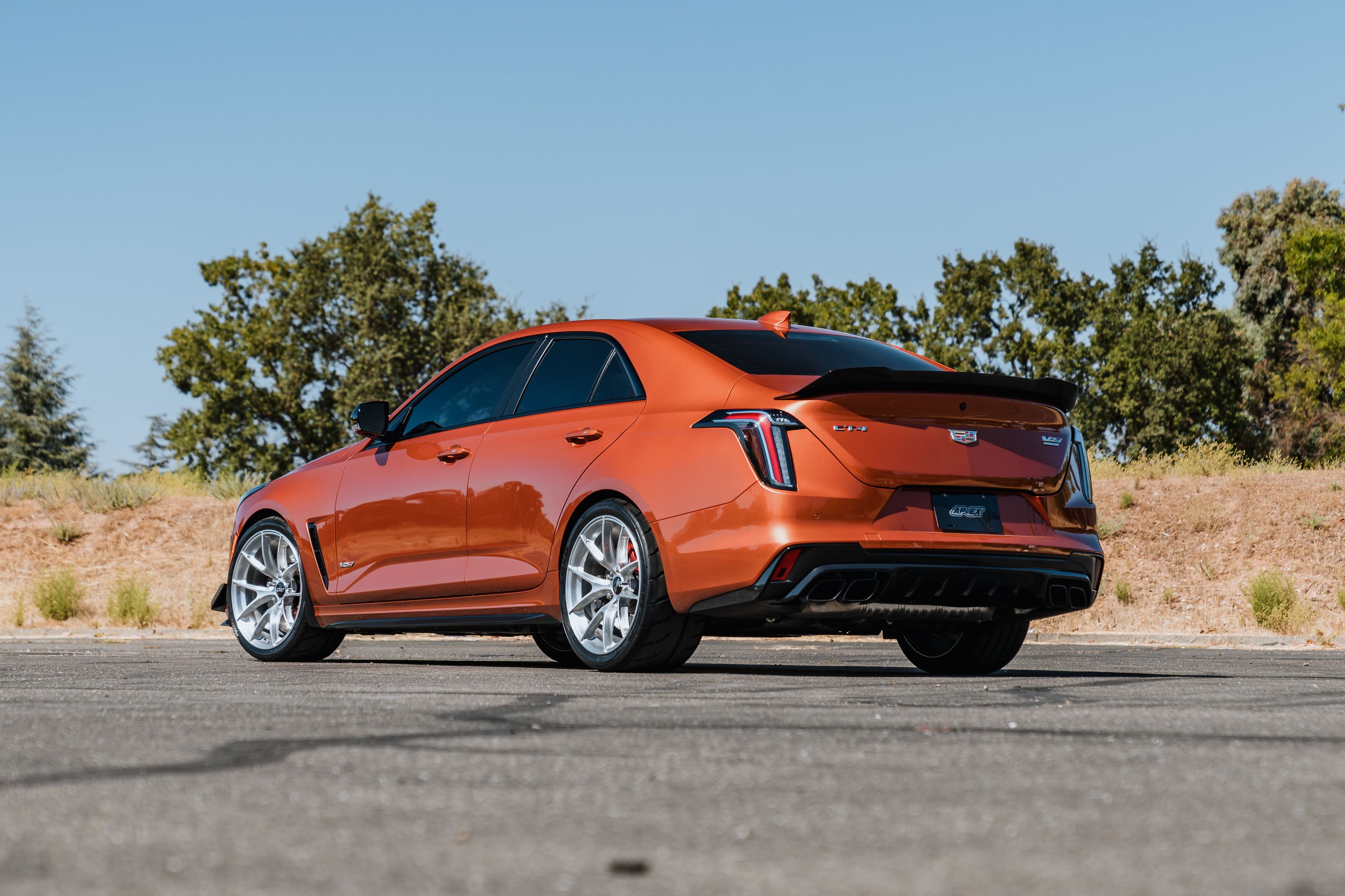 Orange Cadillac CT4-V Blackwing with 19" VS-5RS Apex wheels in Brushed Clear