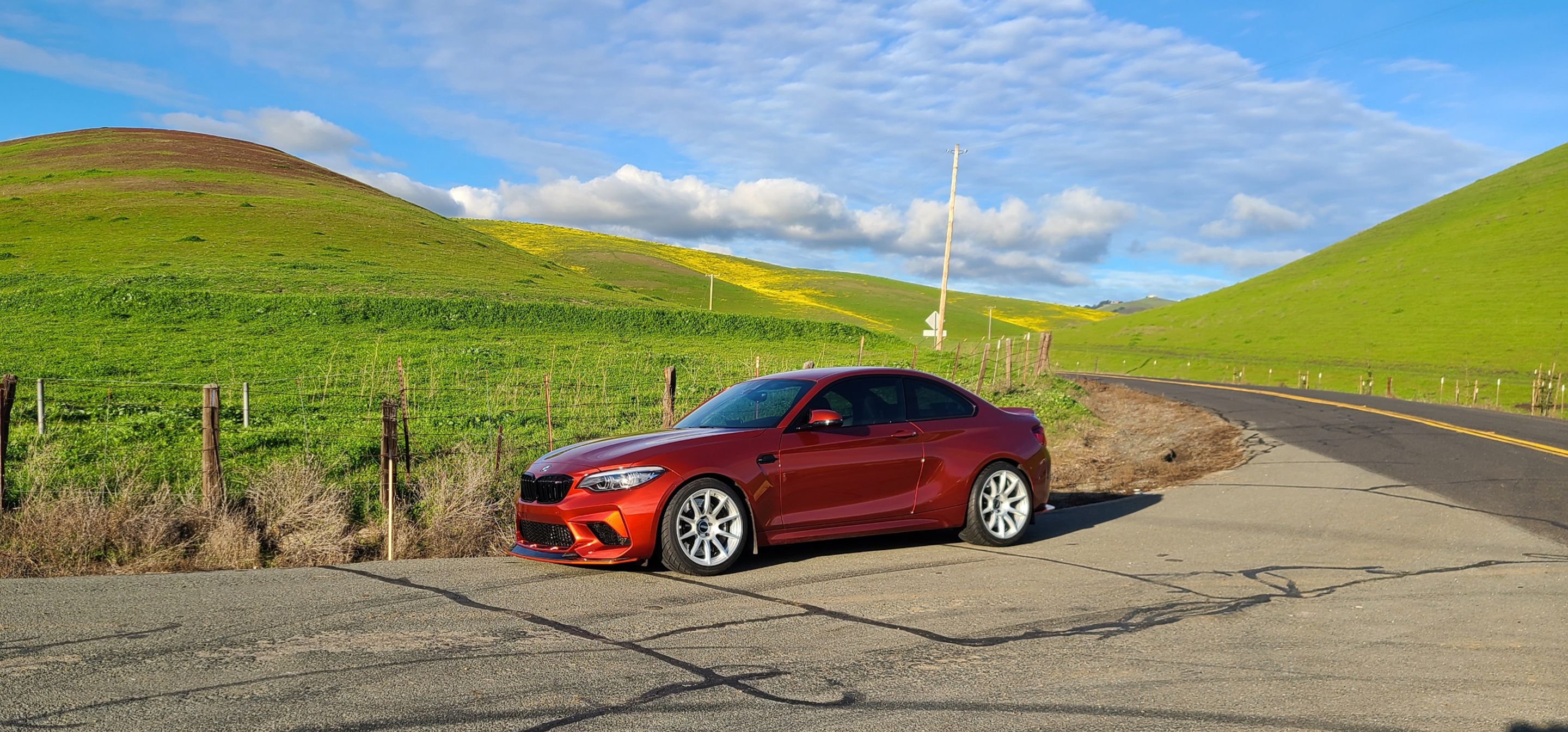 Orange BMW F87 M2 with 18"/19" SM-10 Apex wheels in Race Silver