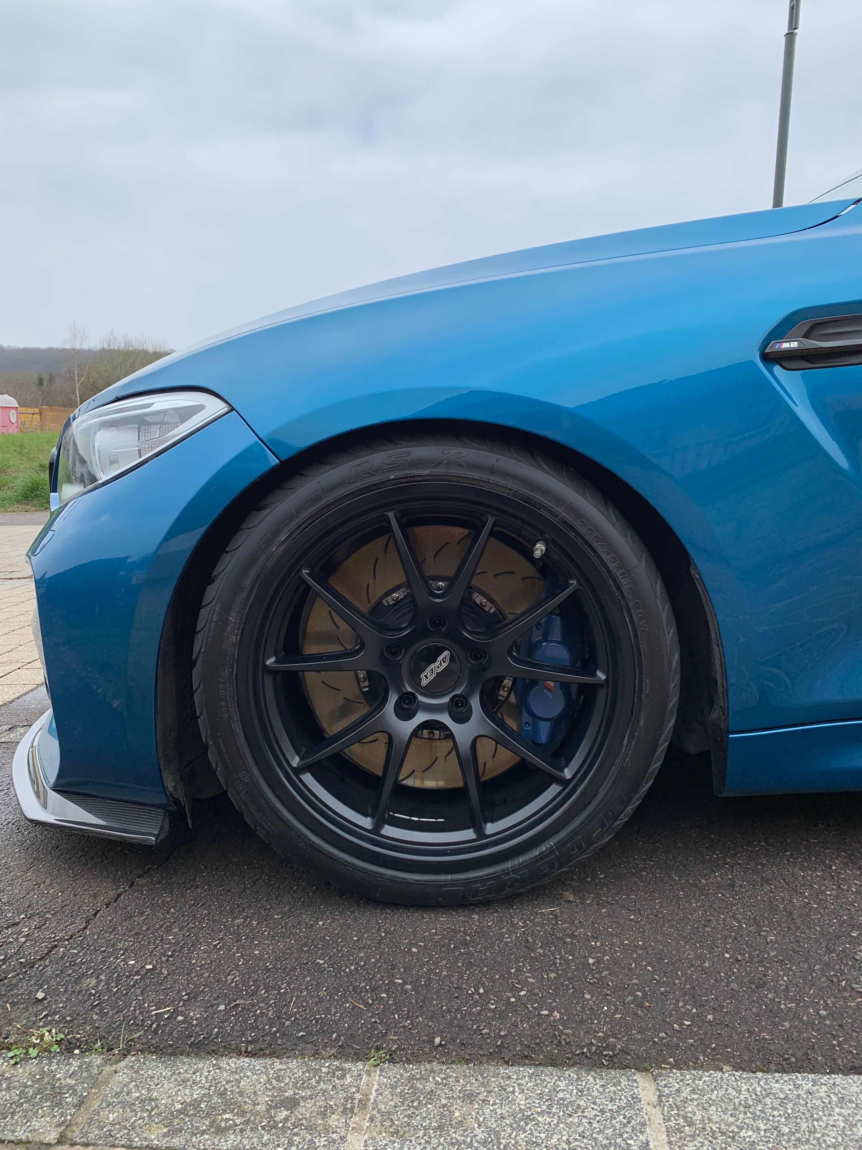 Blue BMW F87 M2 with 18" FL-5 Apex wheels in Satin Black