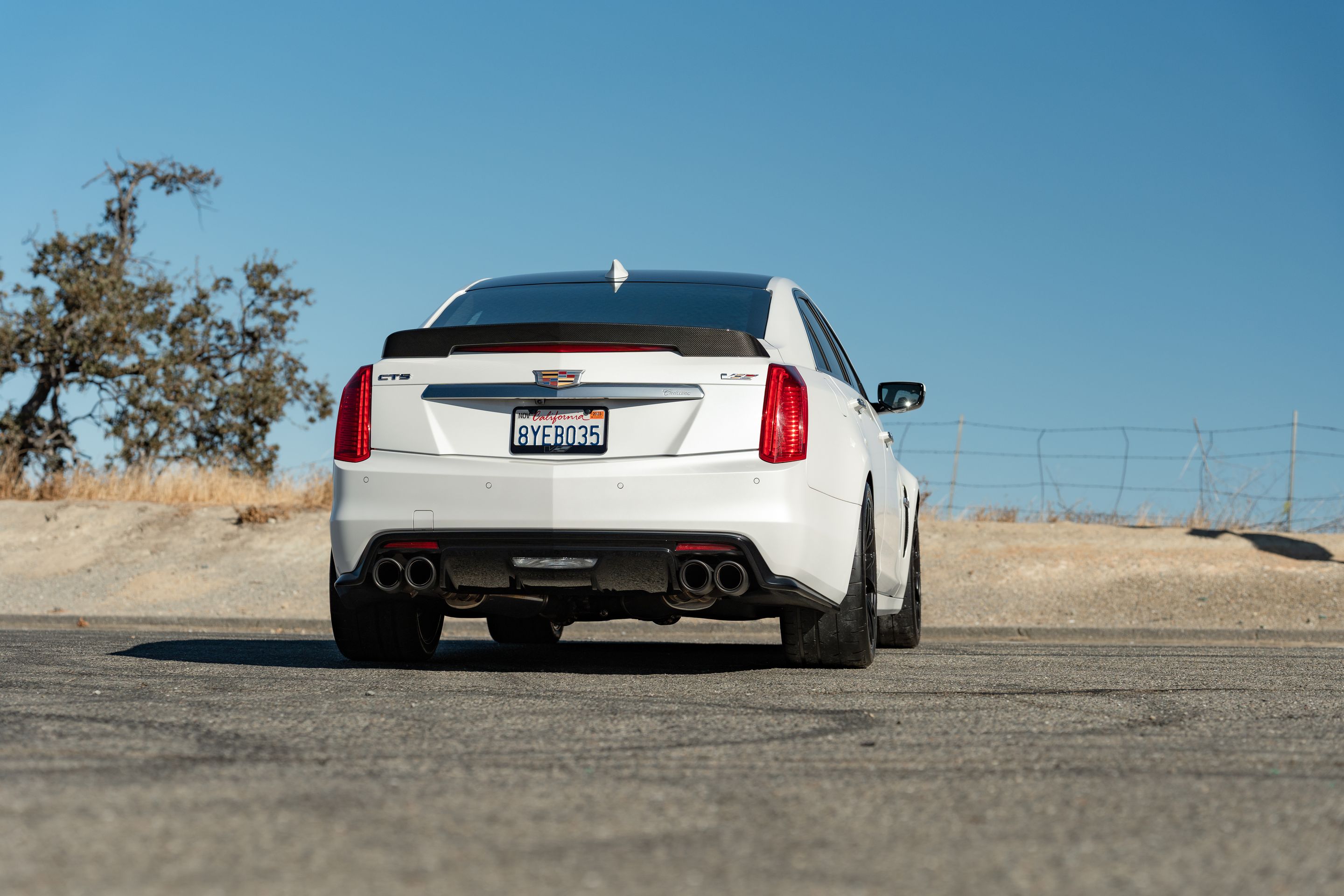 White Cadillac Gen 3 CTS-V with 19" EC-7RS Apex wheels in Satin Black