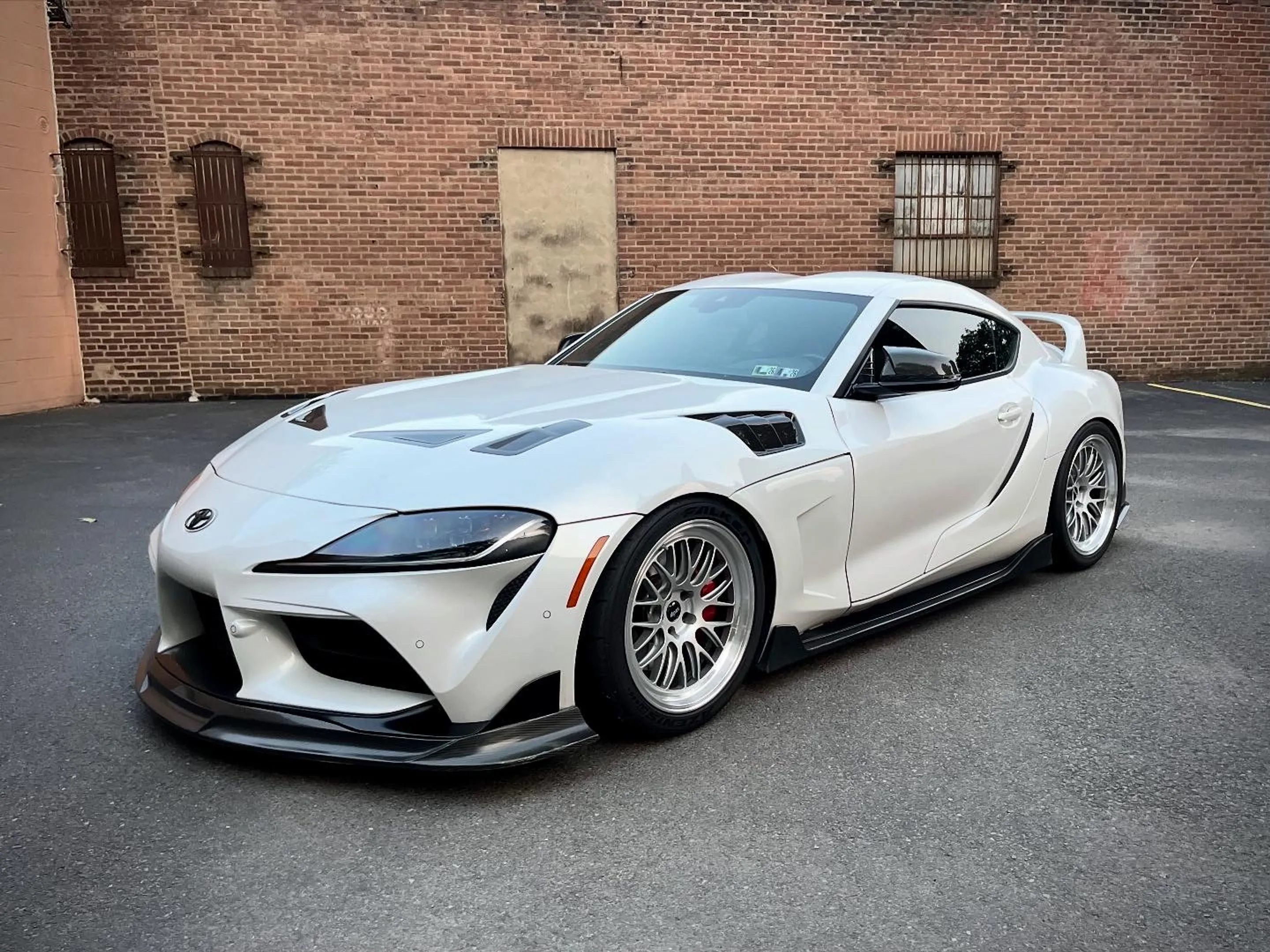 White Toyota GR Supra with 19" ML-10RT Apex wheels in Machined Lip Race Silver