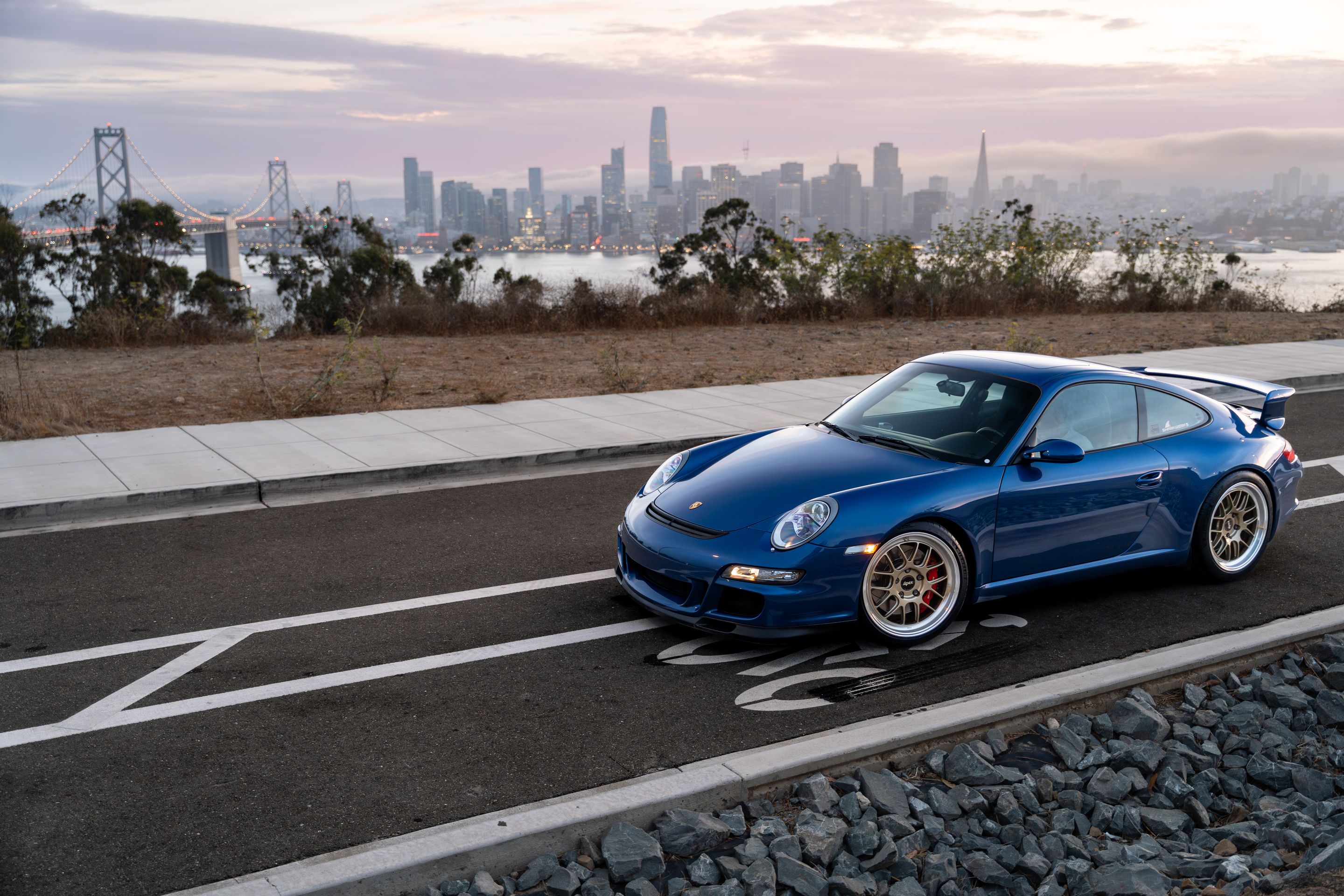 Blue Porsche 911 997 GT3 with 19" TEST-M Apex wheels in Machined Lip Gloss Motorsport Gold