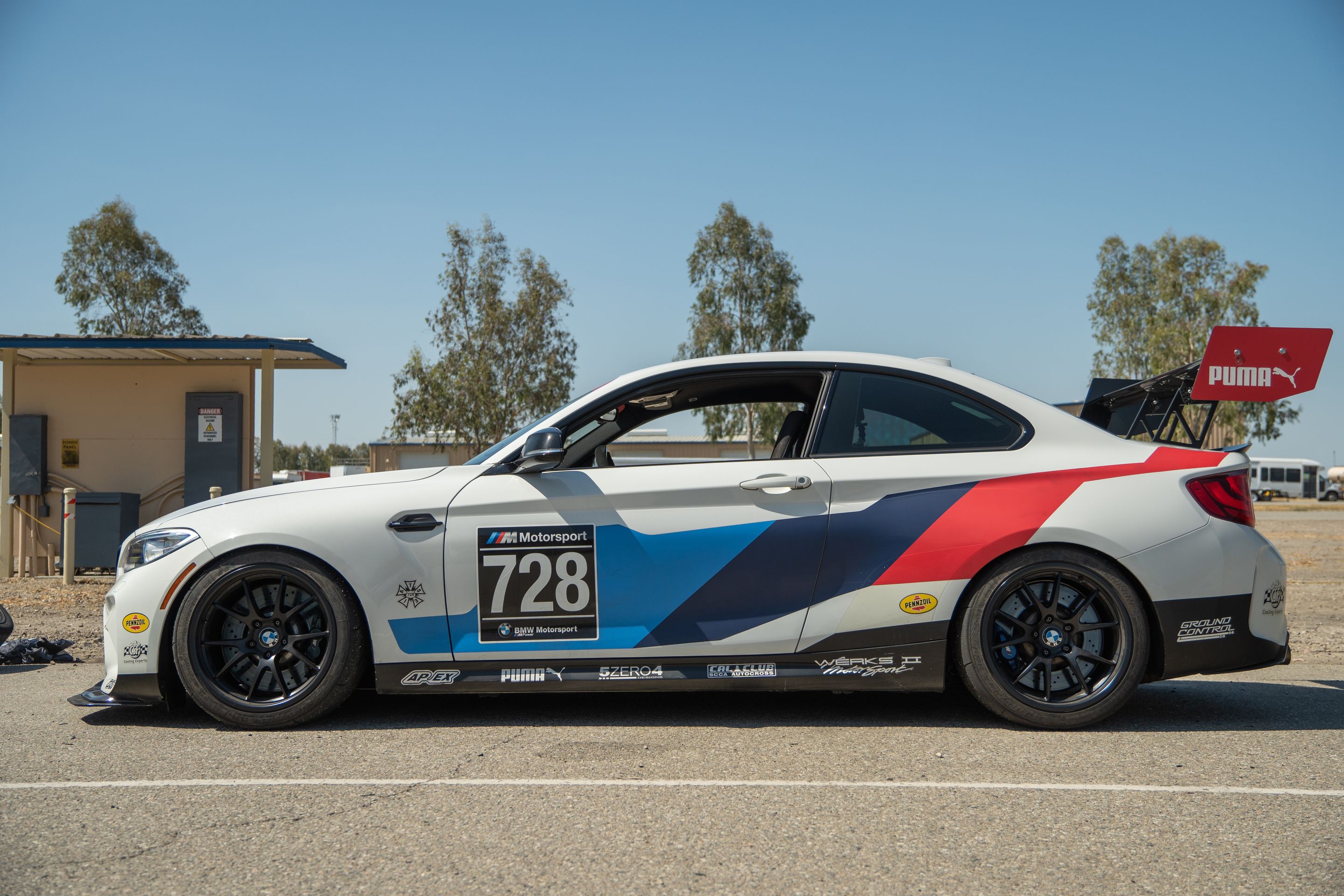 White BMW F87 M2 with 18" FL-5 Apex wheels in Satin Black