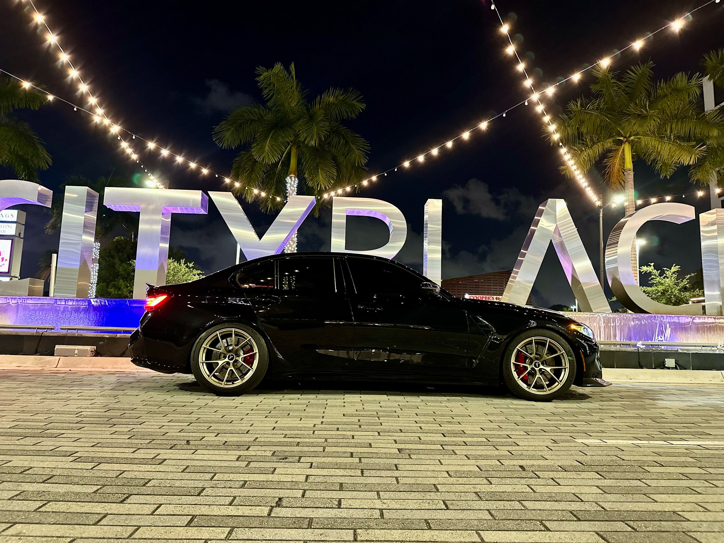 Black BMW G80 M3 with 19" VS-5RS Apex wheels in Motorsport Gold