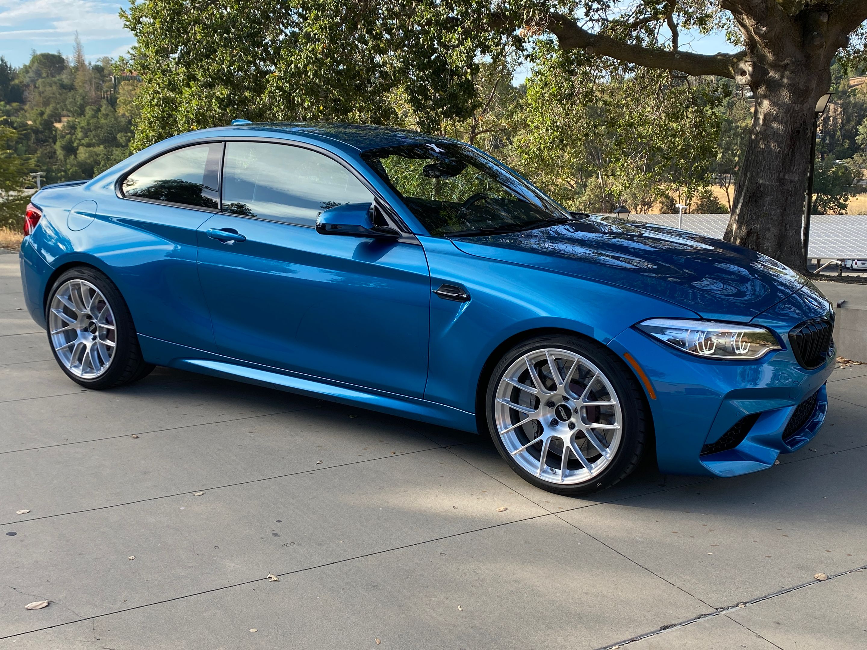 Blue BMW F87 M2 with 19" EC-7RS Apex wheels in Brushed Clear