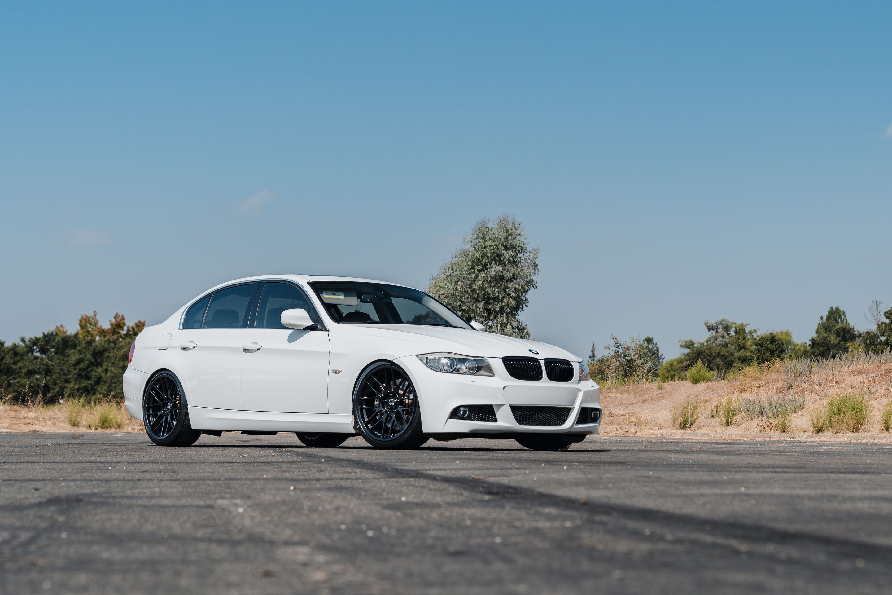 White BMW E90 LCI Sedan 3 Series with 19" ARC-8RT Apex wheels in Satin Black