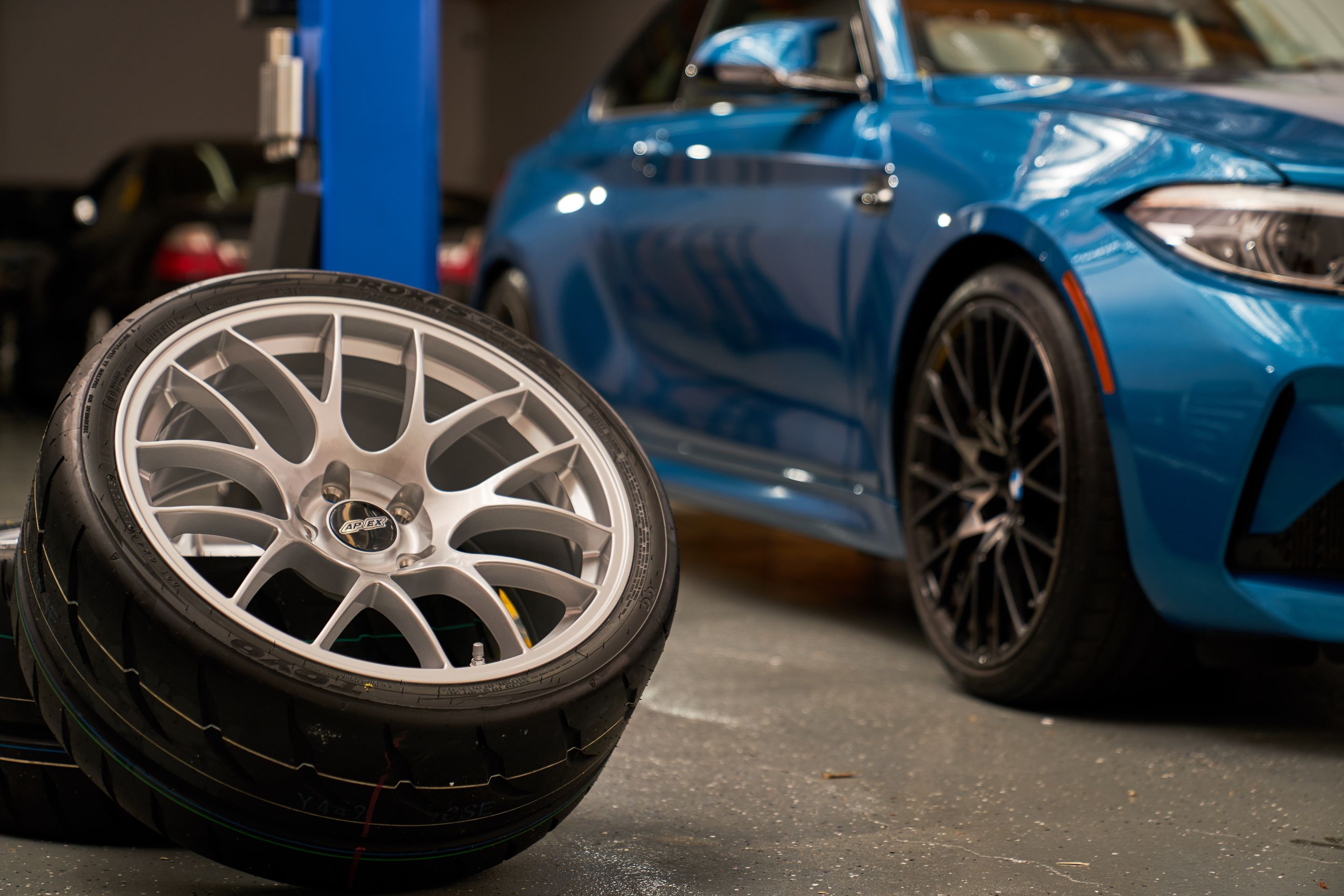 Blue BMW F87 M2 with 19" EC-7 Apex wheels in Race Silver