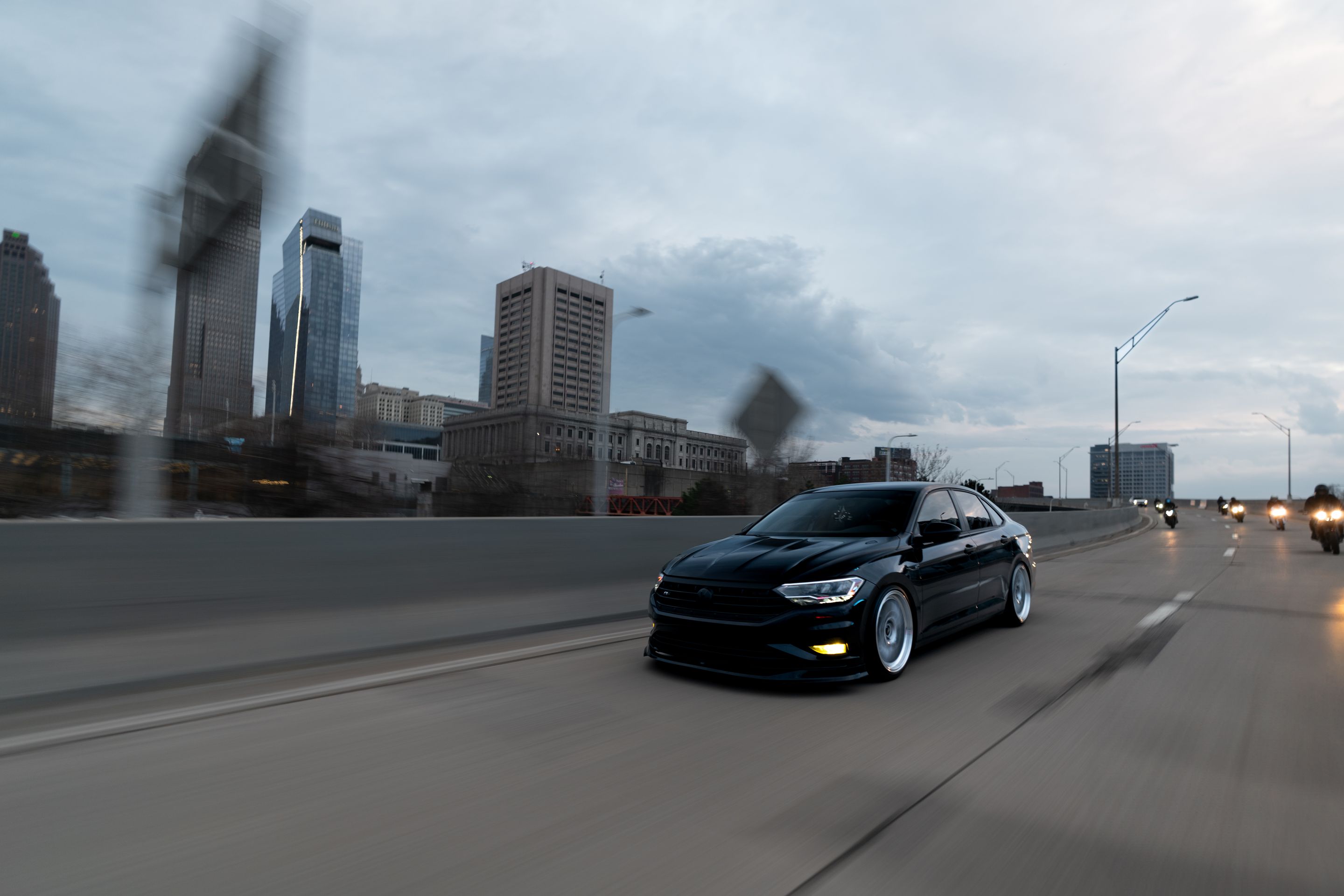 Black VW MK7 Jetta with 19" ML-10RT Apex wheels in Machined Lip Race Silver