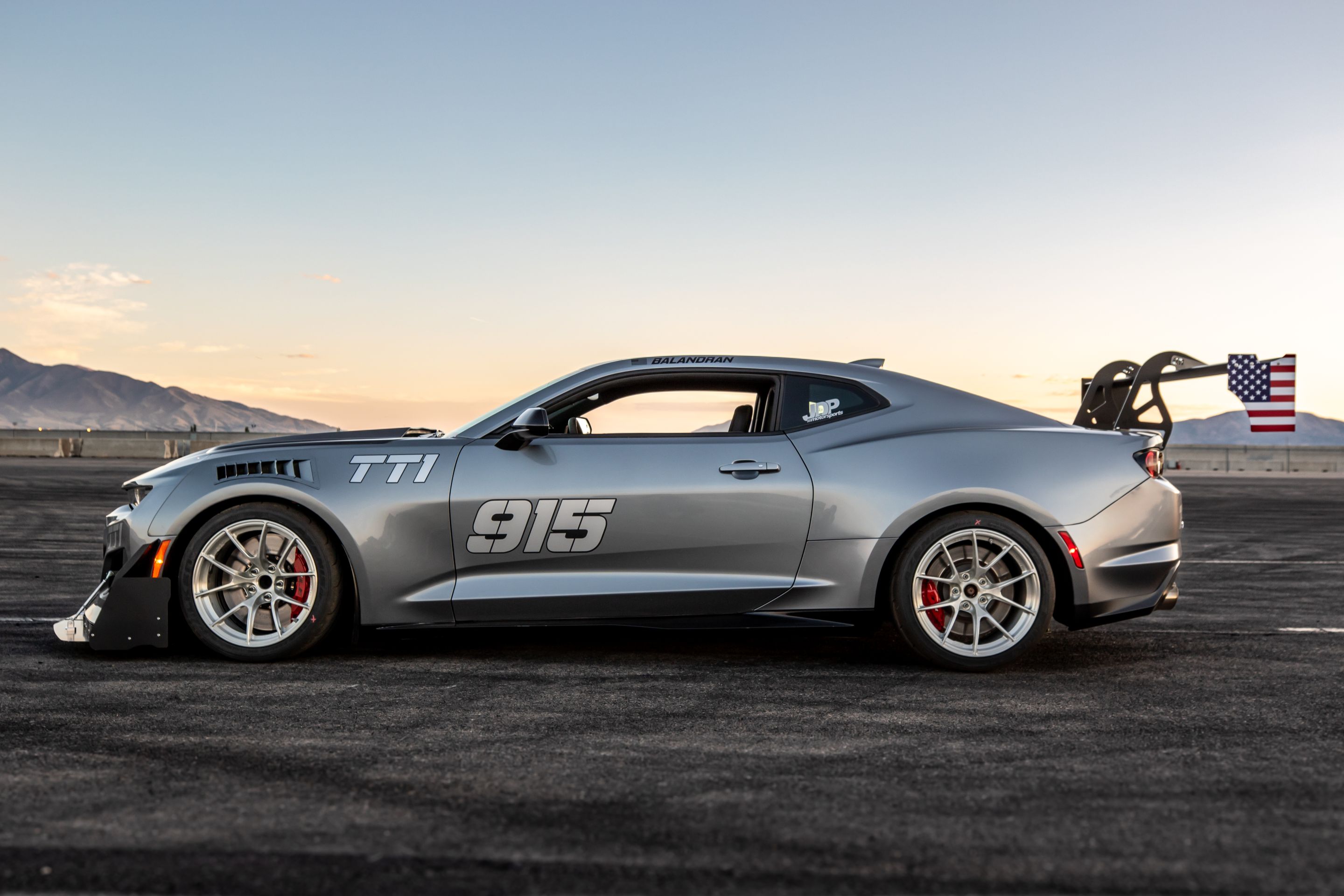 Grey Chevrolet 6th Gen Camaro ZL1 1LE with 18" VS-5RS Apex wheels in Brushed Clear
