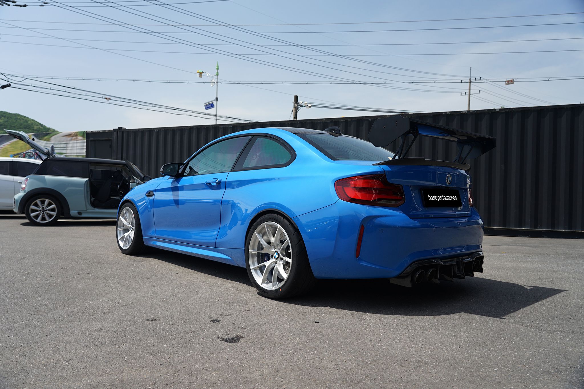 Blue BMW F87 M2 with 18" VS-5RS Apex wheels in Brushed Clear