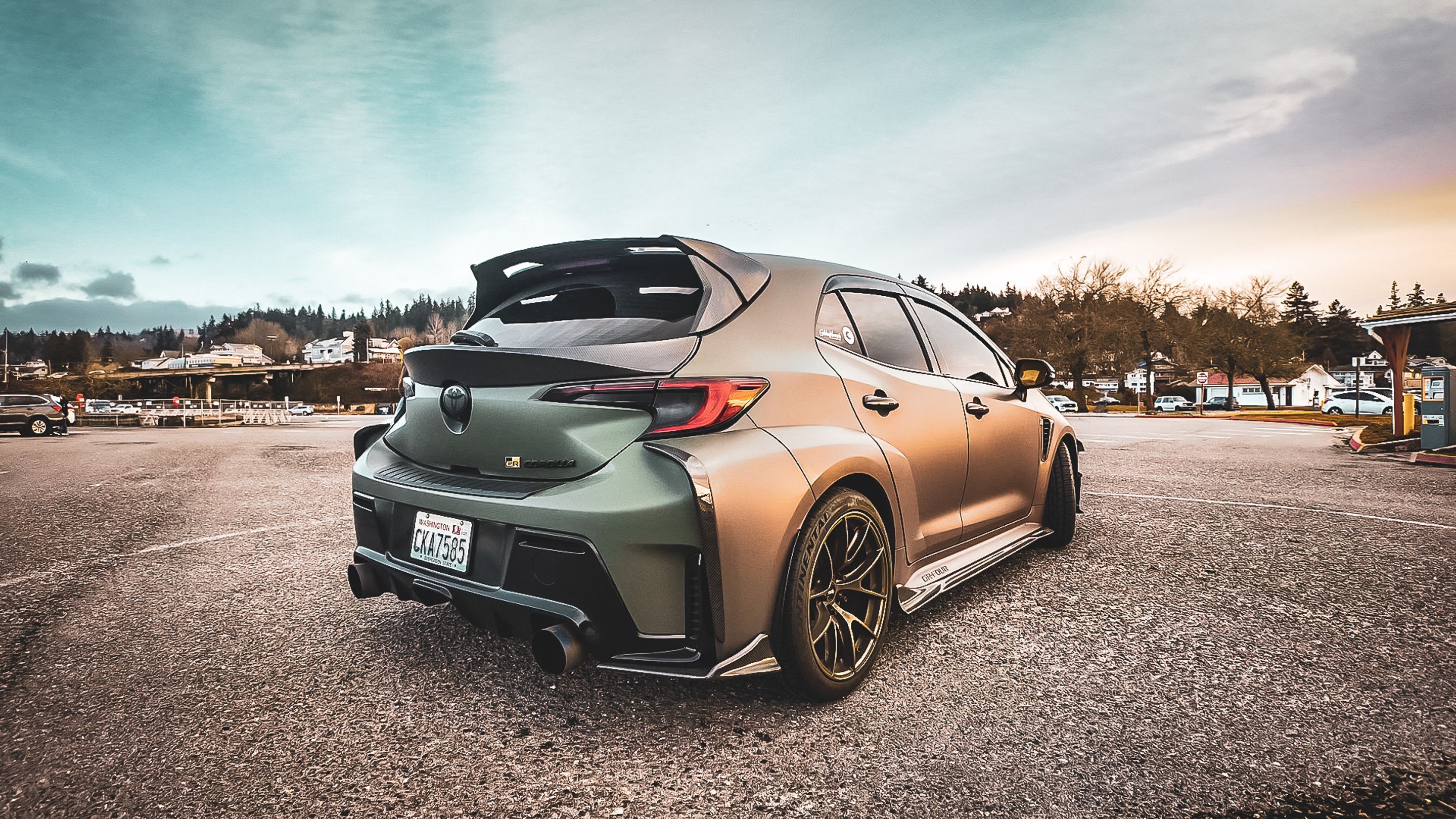 Green Toyota GR Corolla with 18" VS-5RS Apex wheels in Satin Bronze