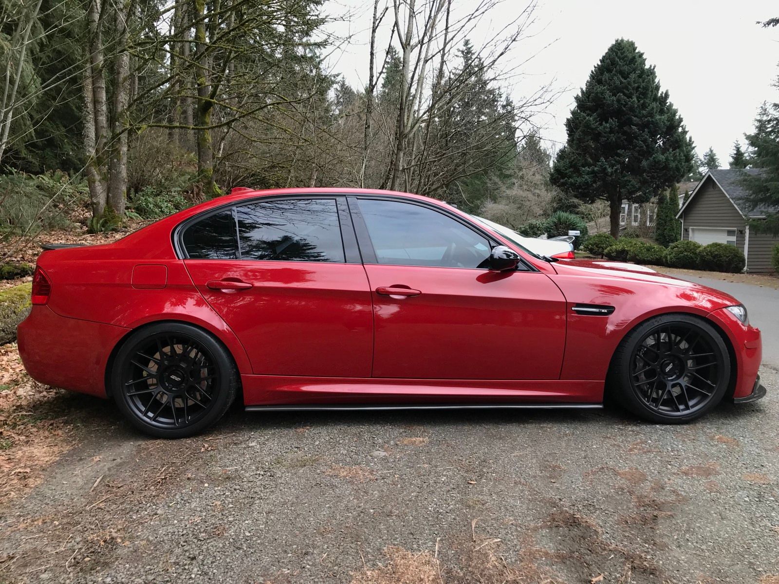 Red BMW E90 Sedan M3 with 19" ARC-8 Apex wheels in Satin Black