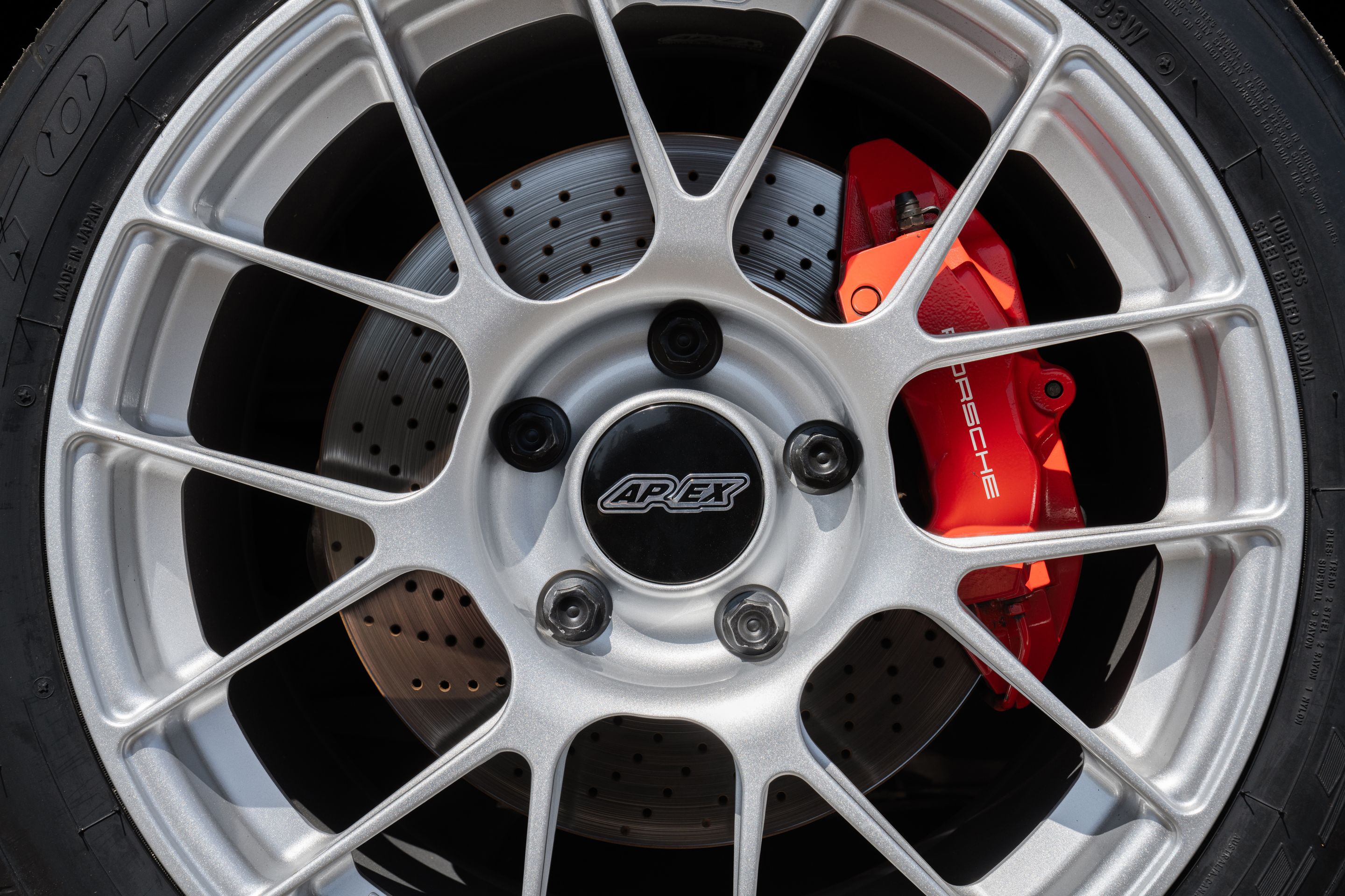 Black Porsche 911 997 Carrera 4S with 18" EC-7RS Apex wheels in Race Silver