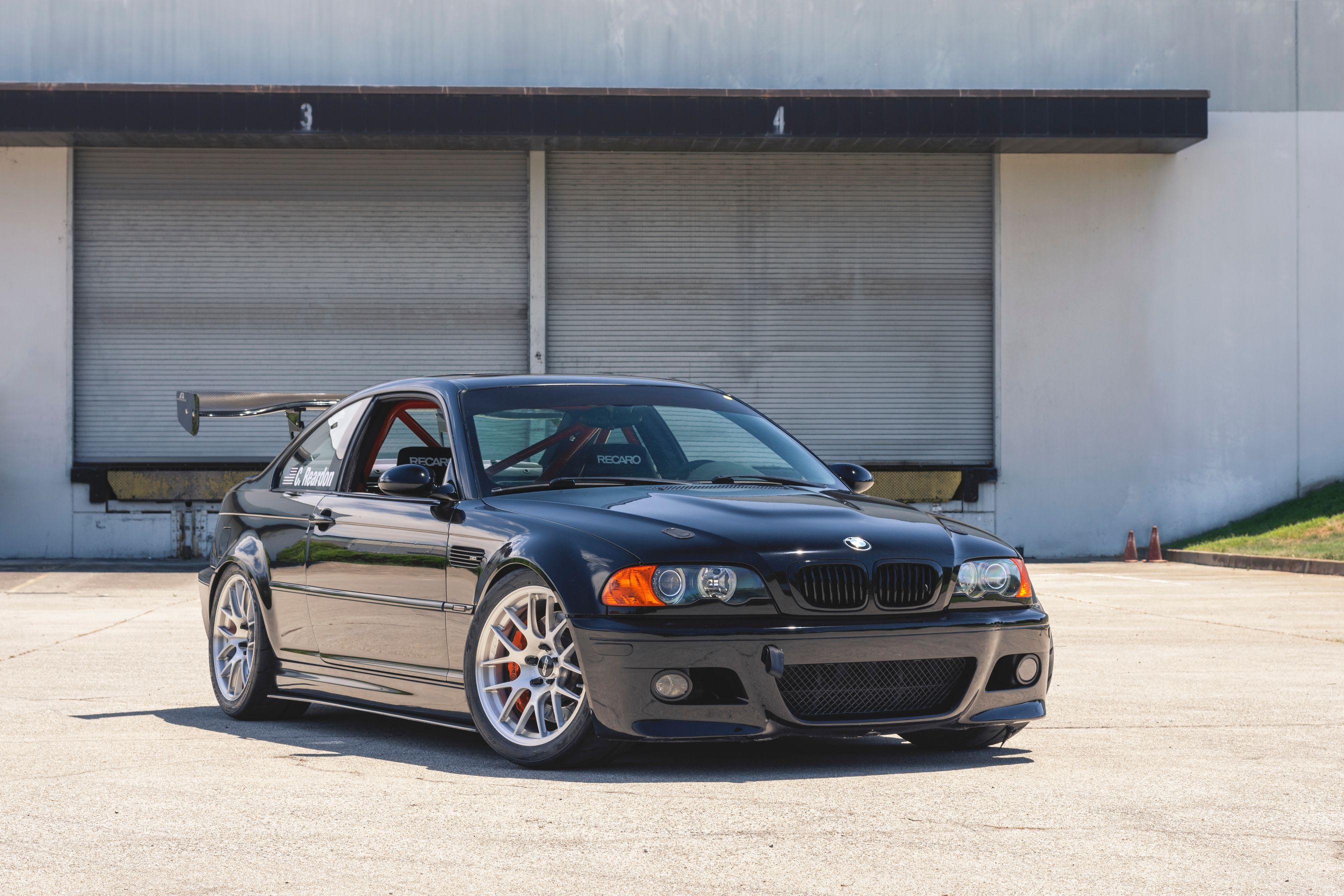 Black BMW E46 M3 with 18" EC-7R Apex wheels in Brushed Clear