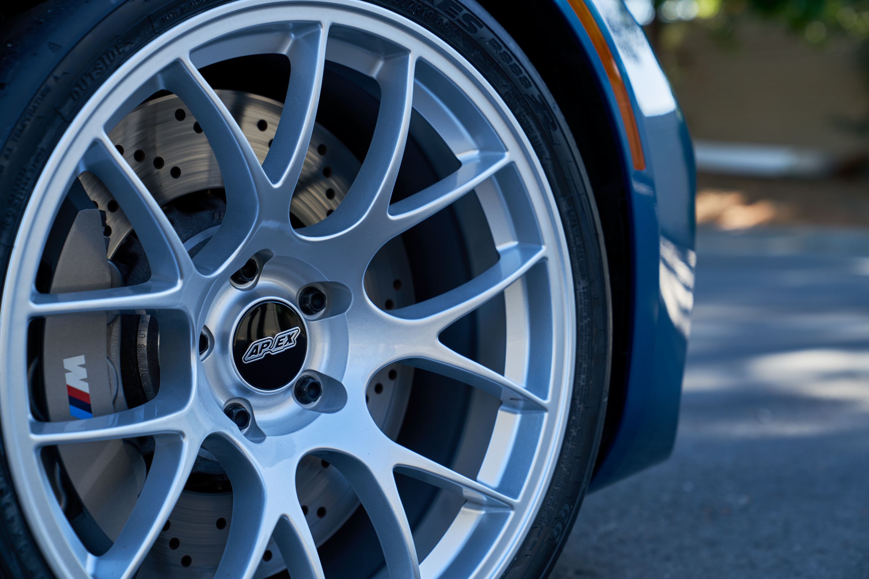 Blue BMW F87 M2 with 19" EC-7 Apex wheels in Race Silver