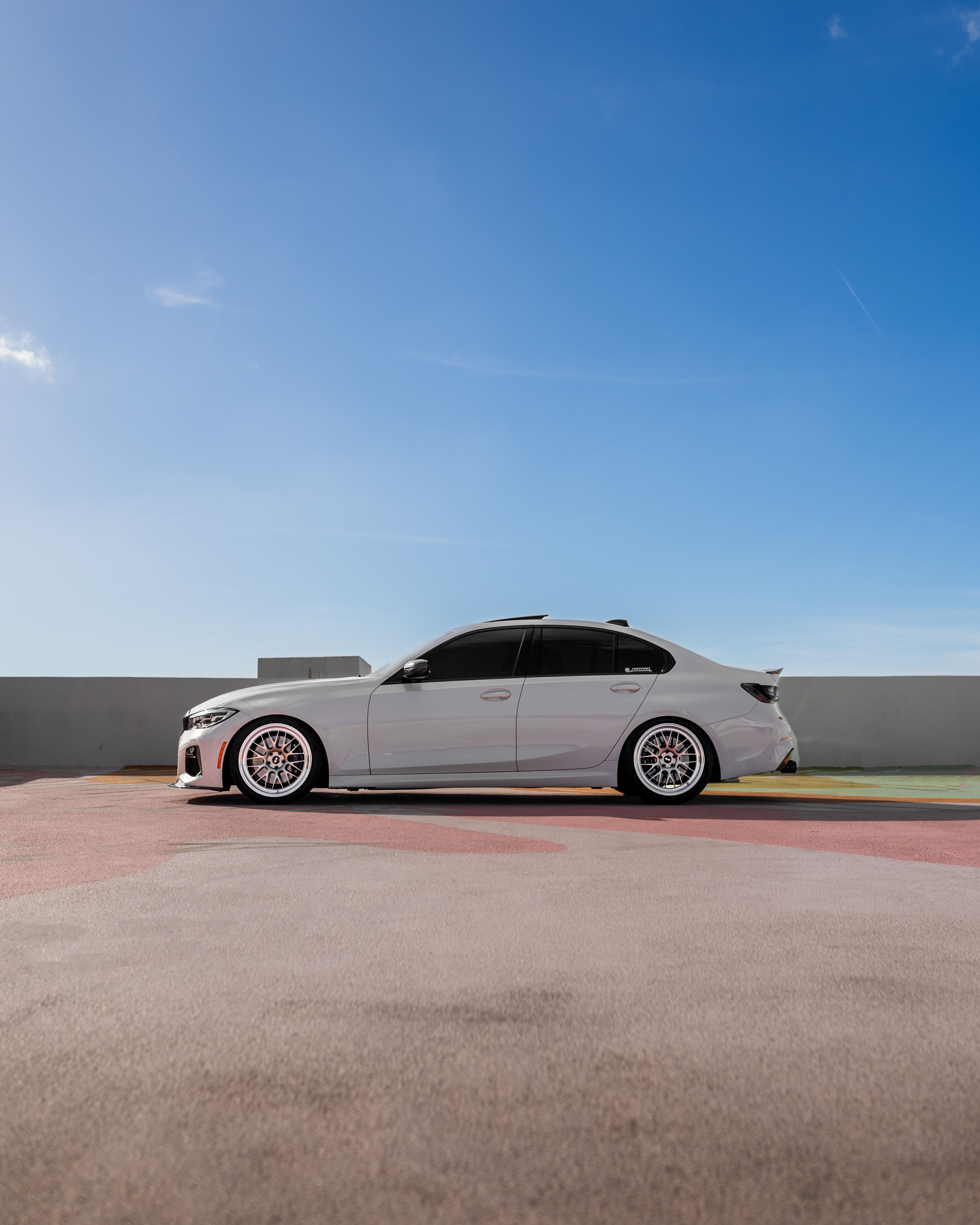White BMW G20 Sedan 3 Series with 19" ML-10RT Apex wheels in Machined Lip Gloss Motorsport Gold