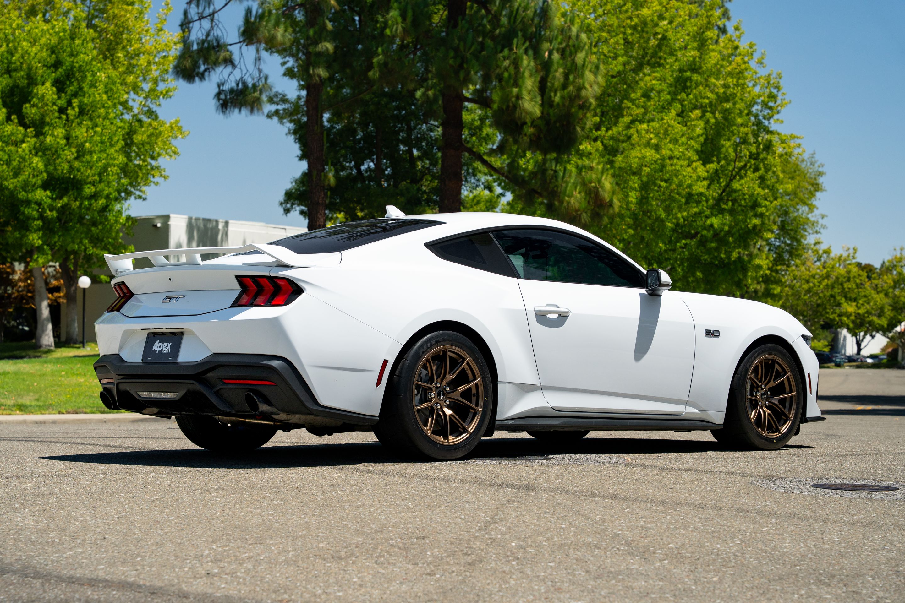 White Ford S650 Mustang GT with 18" VS-5RS Apex wheels in Satin Bronze