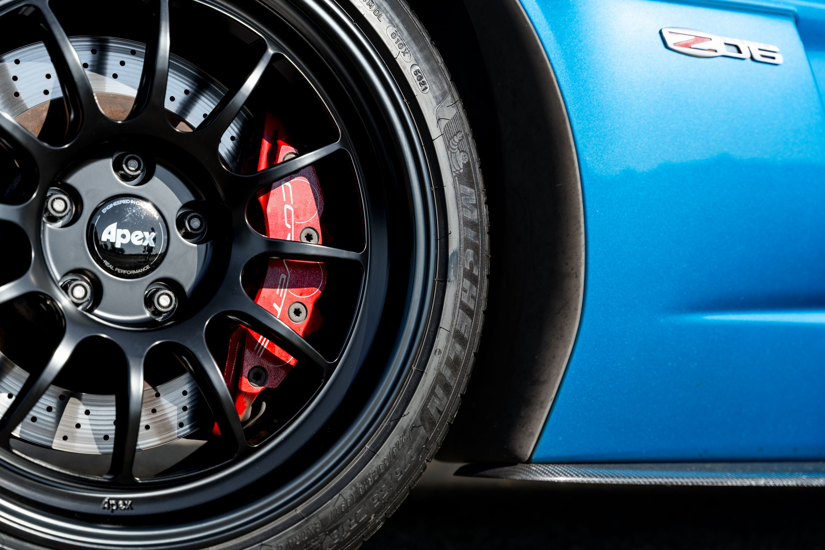 Blue Chevrolet C6 Corvette Z06 with 18"/19" TEST-S Apex wheels in Satin Black