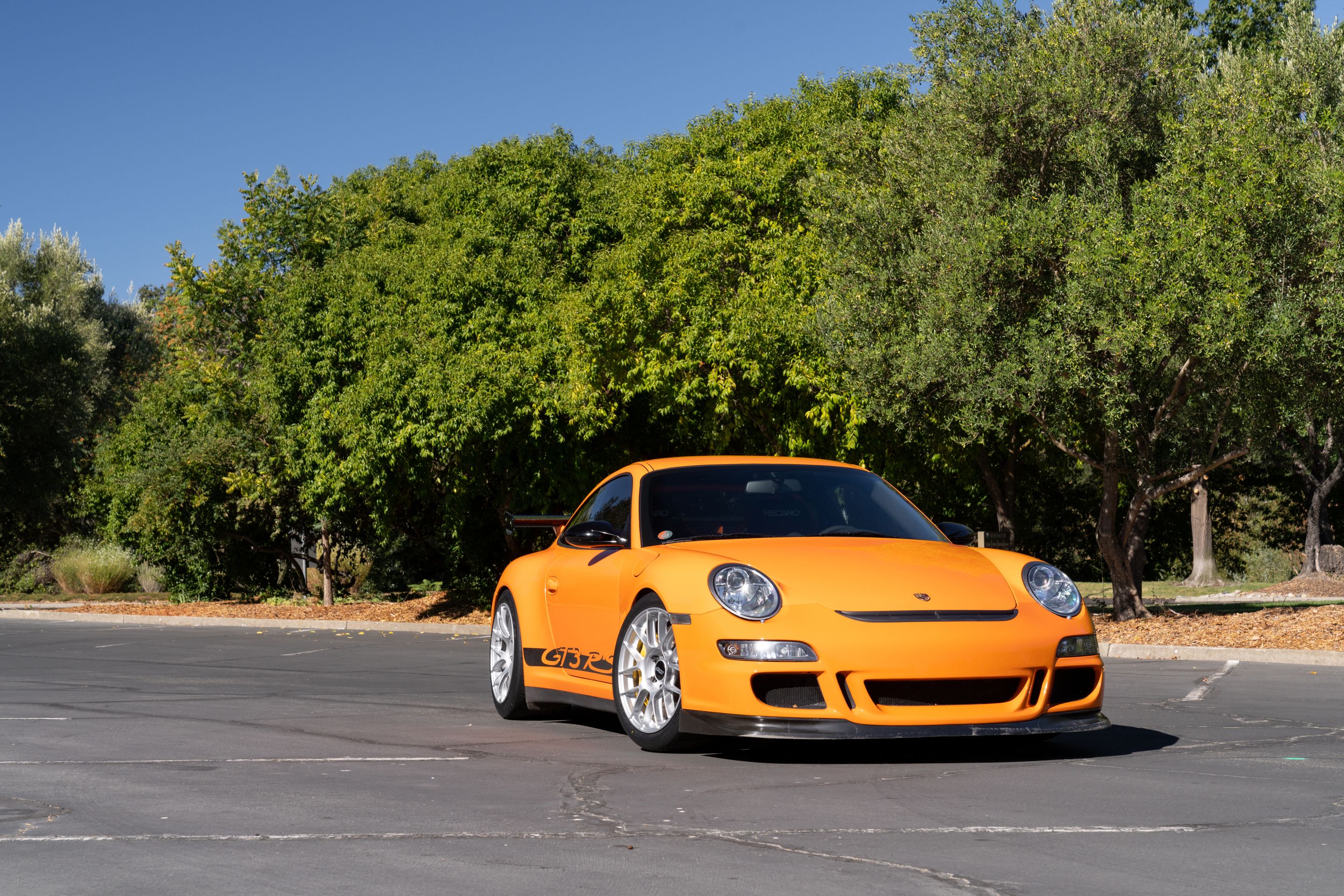 Orange Porsche 911 997 GT3 RS with 18" EC-7RS Apex wheels in Race Silver