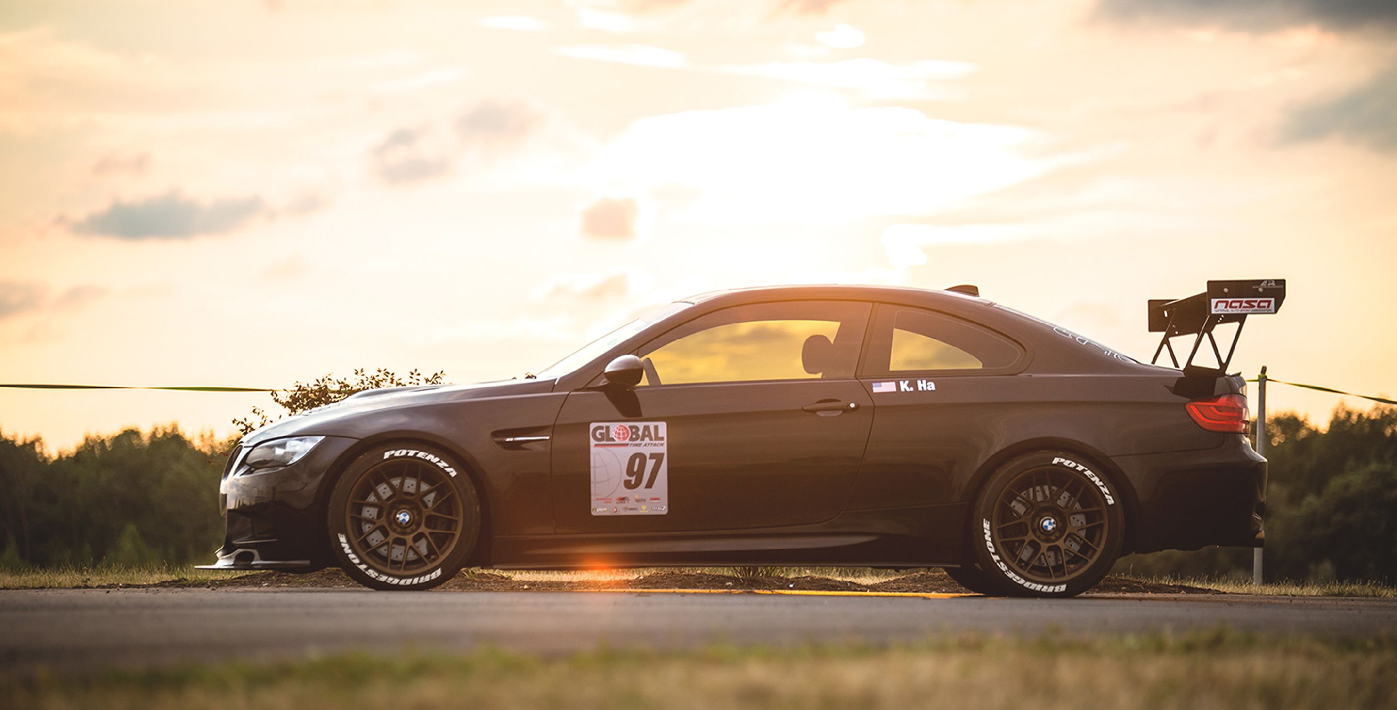 Black BMW E92 Coupe M3 with 18" ARC-8 Apex wheels in Satin Bronze