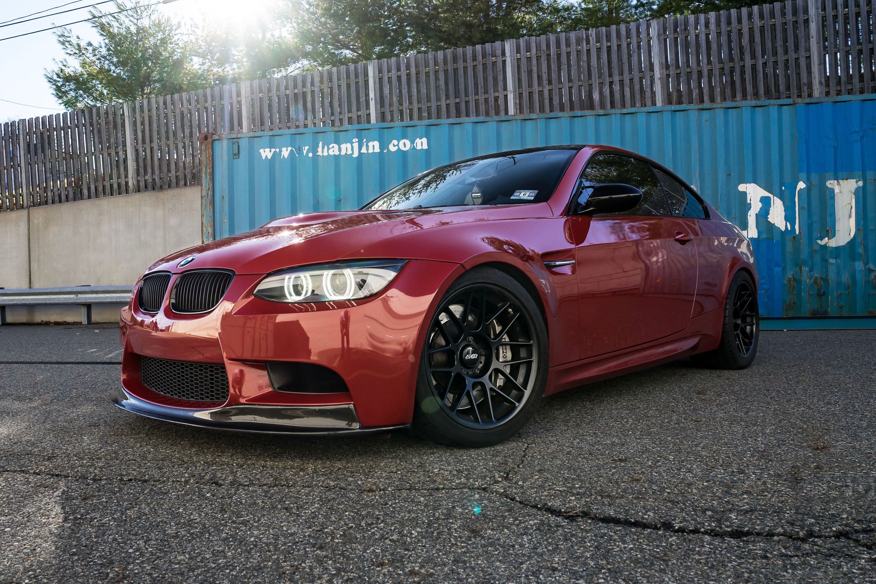 Red BMW E92 Coupe M3 with 18" ARC-8 Apex wheels in Satin Black
