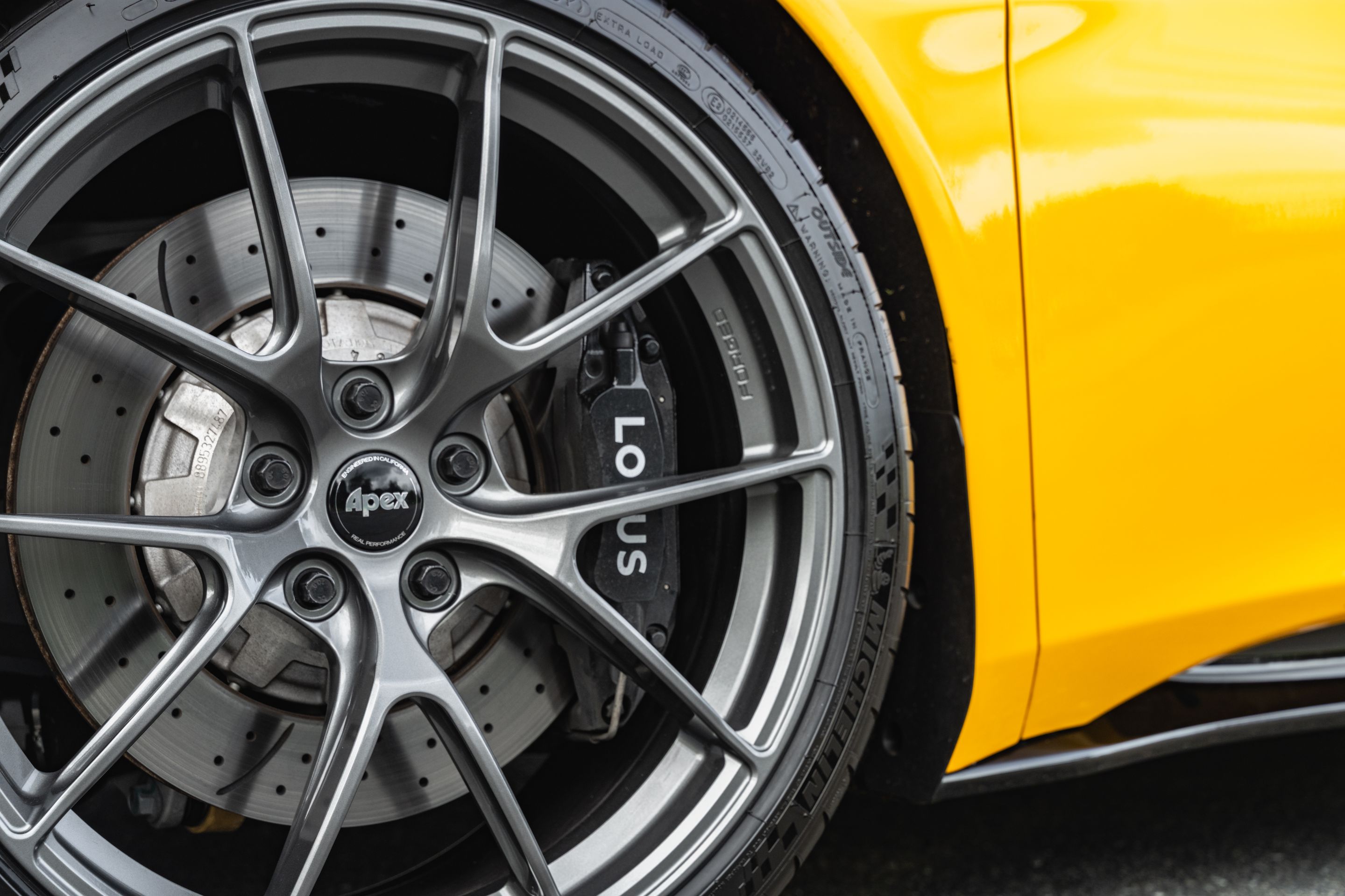 Yellow Lotus Emira with 20" VS-5RS Apex wheels in Anthracite