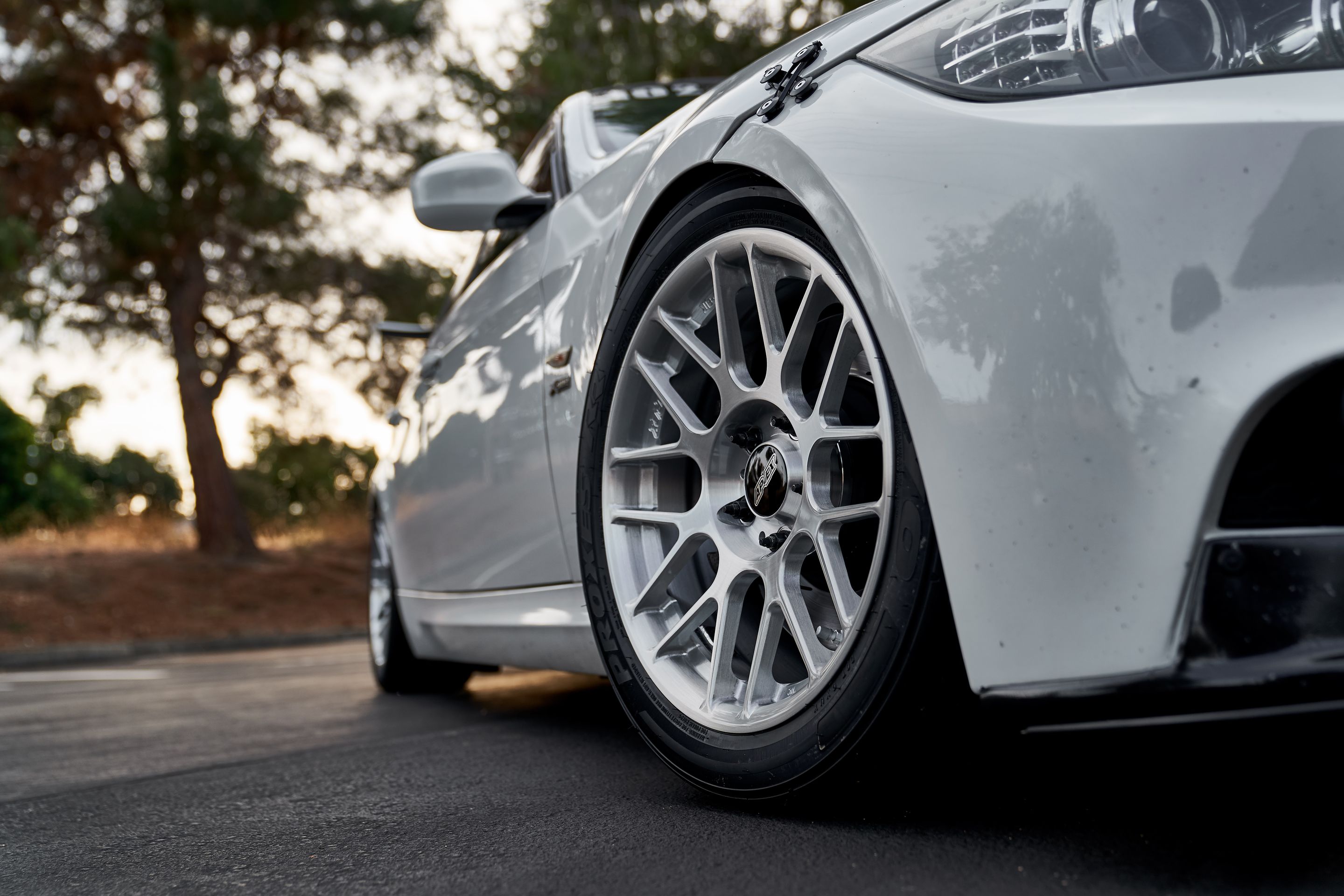 White BMW E90 LCI Sedan 3 Series with 17" ARC-8R Apex wheels in Brushed Clear